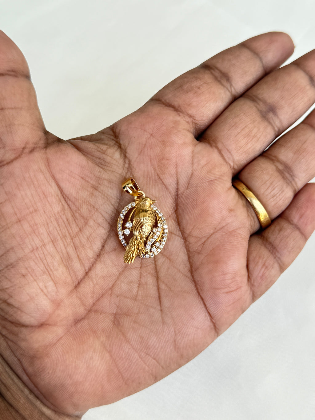 L006 bird small locket