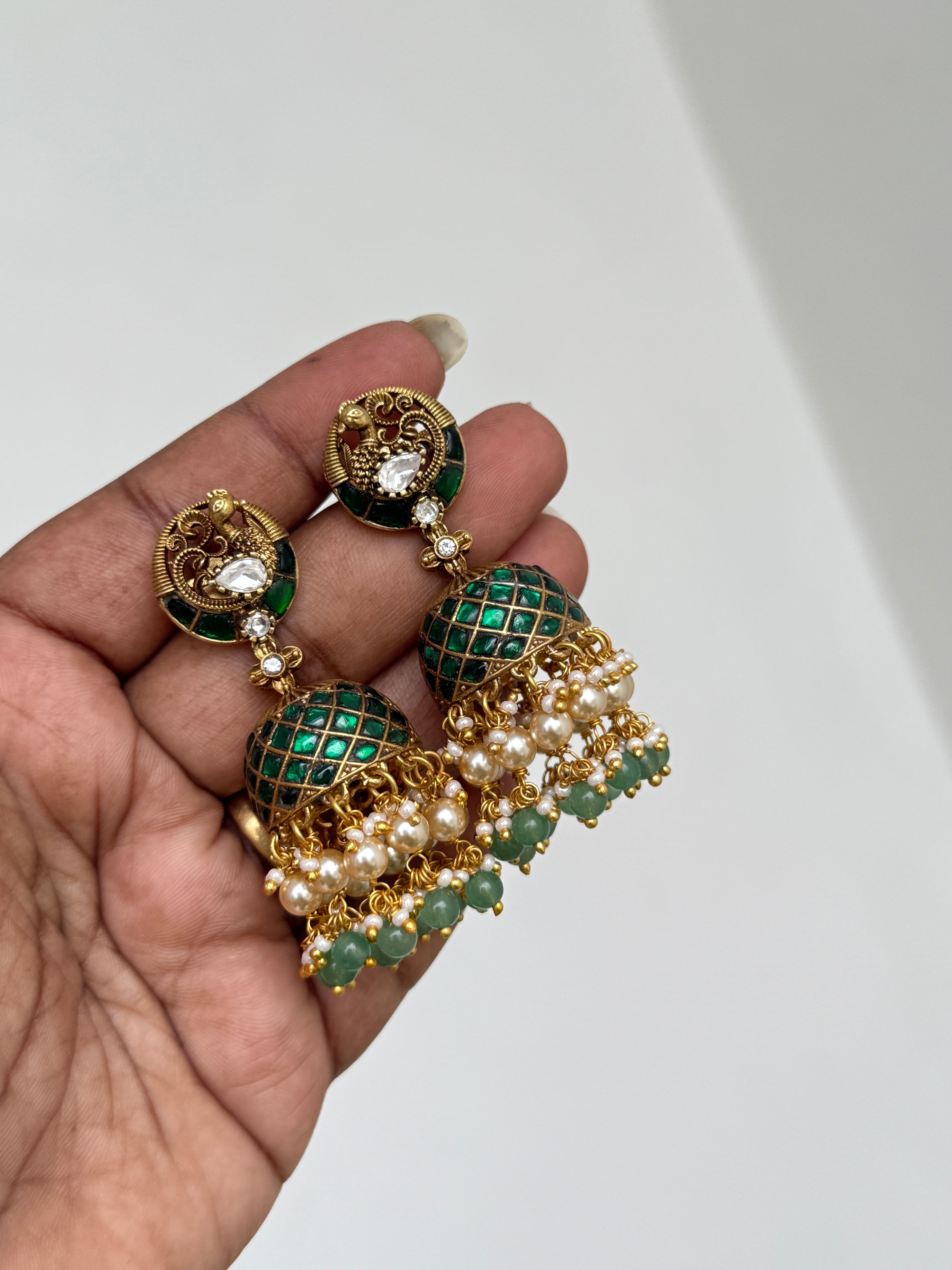 Er140 jadau kundan peacock butta earrings