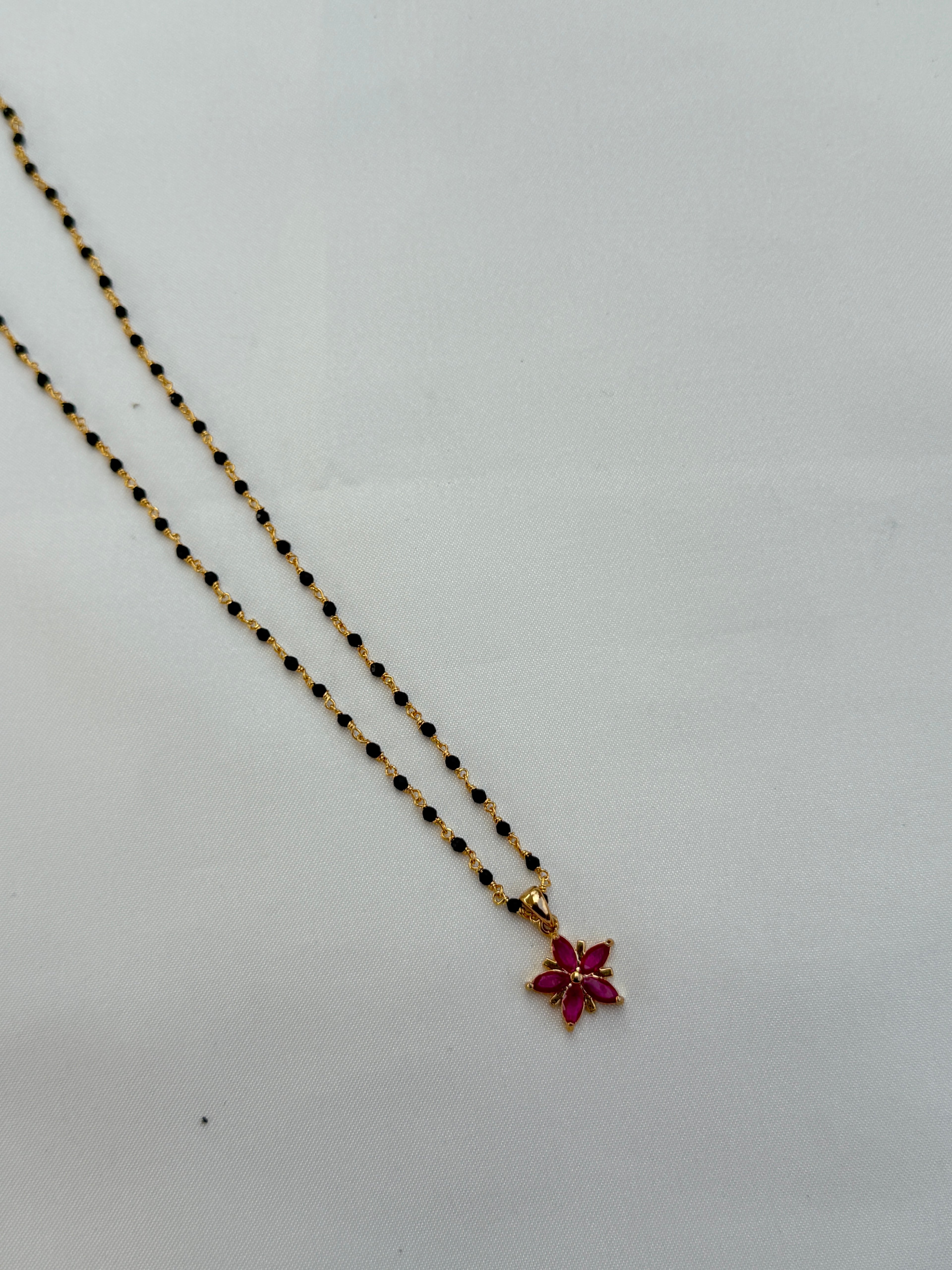 Bb045 single line flower black beads