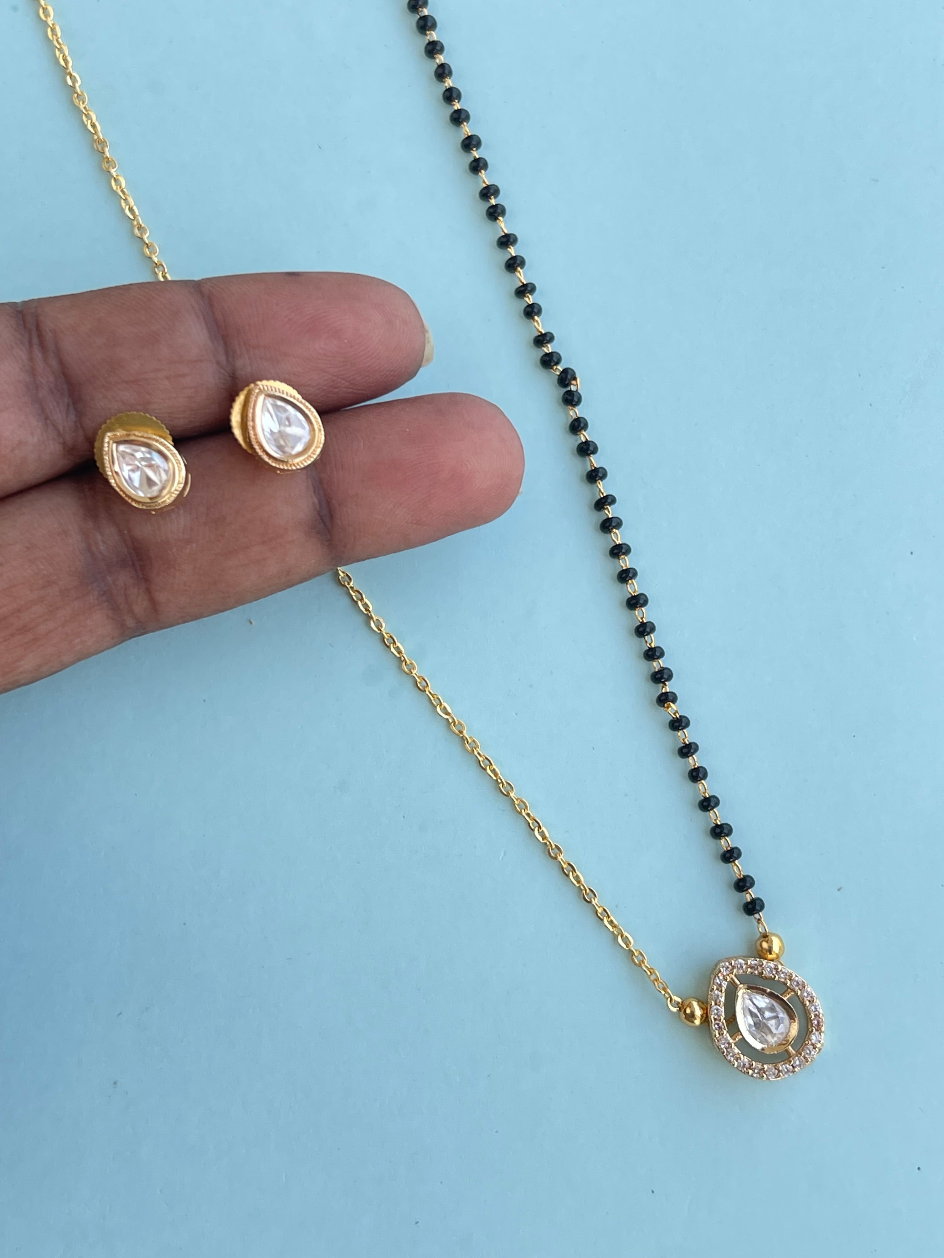 Simple Kundan pendent with Earrings blackbeads (mangalsutra)