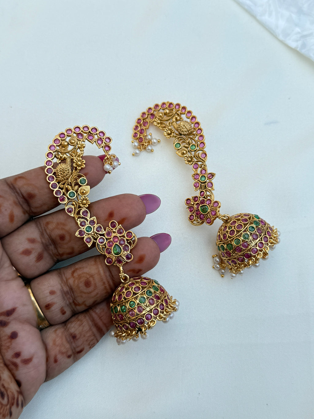 Er231 kemp peacock butta earcuffs