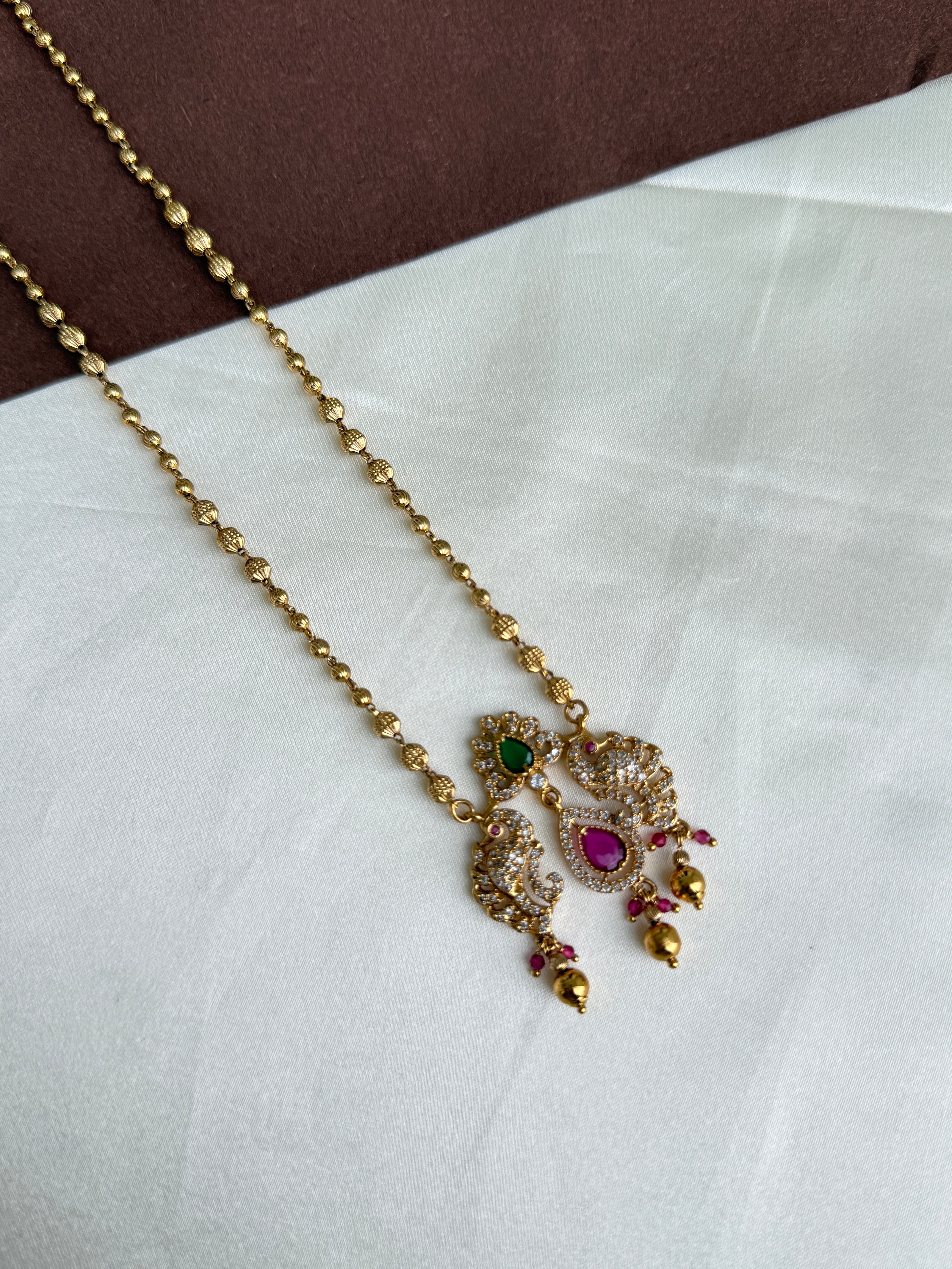 Dc026 gold balls chain with dual peacock pendant