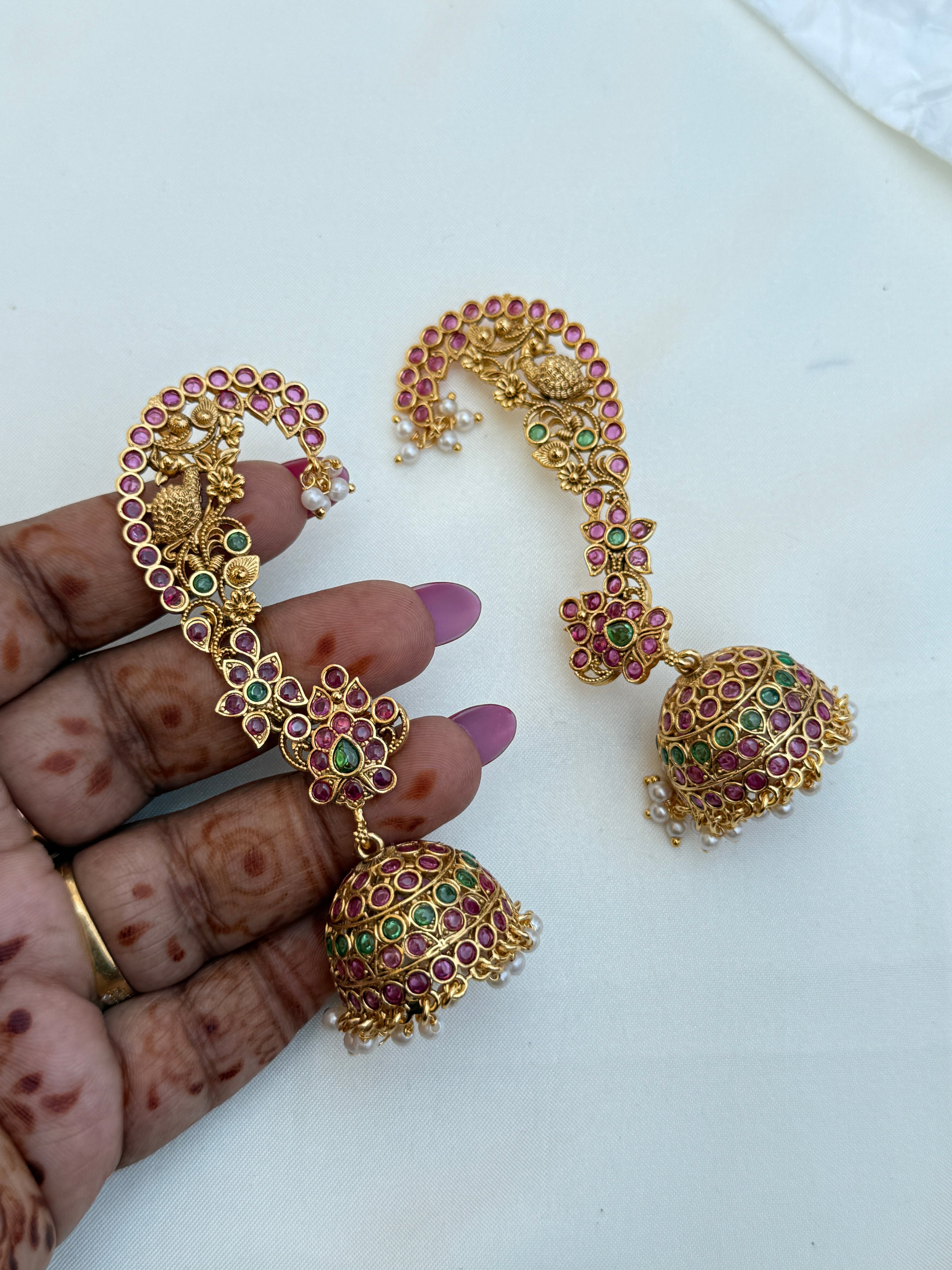 Er231 kemp peacock butta earcuffs