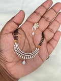 2 lines short Black Beads with diamond finish locket and earrings BB5173