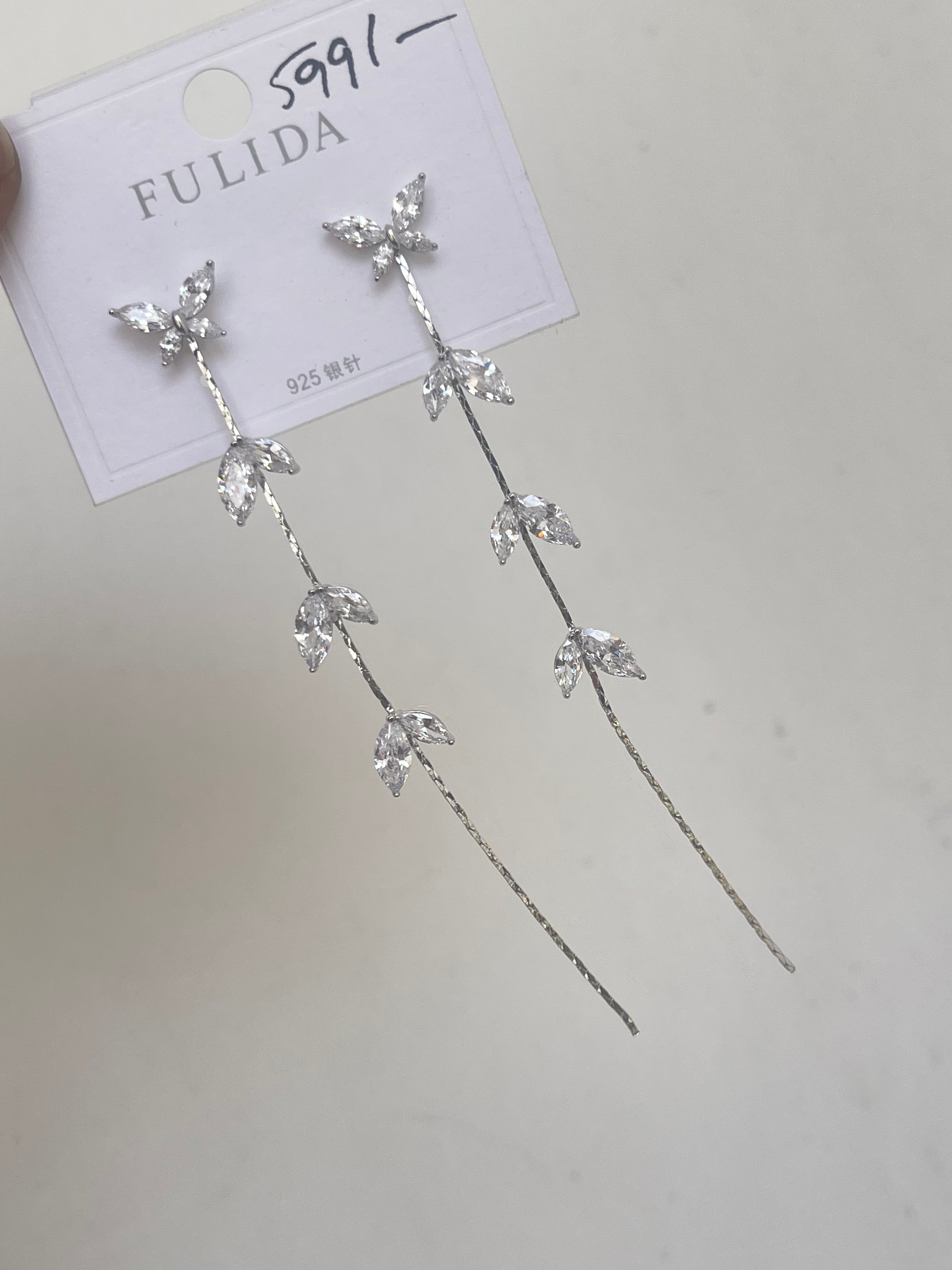 Butterfly tassels in silver and rosegold