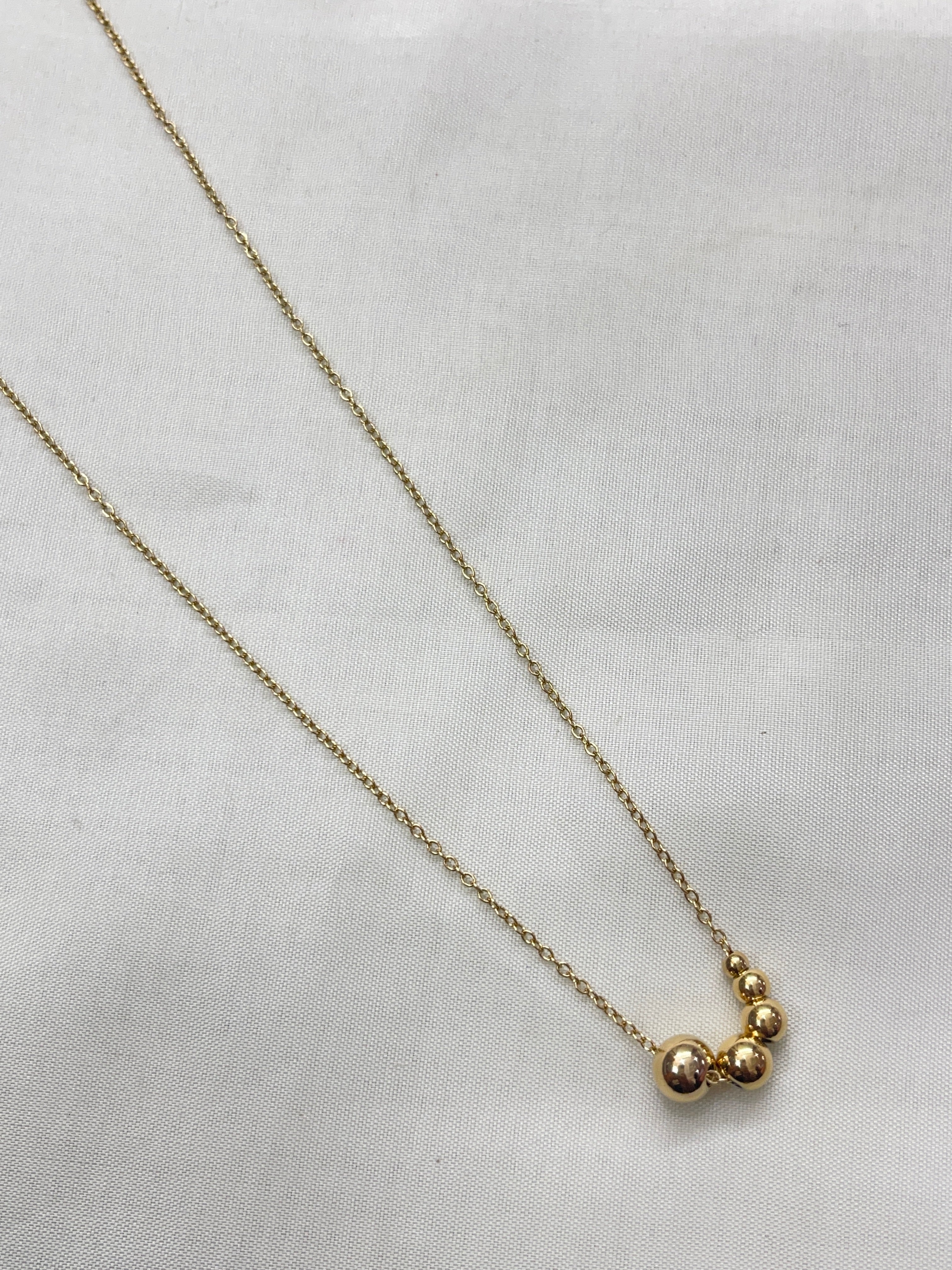 5 gold ball neckline dc504