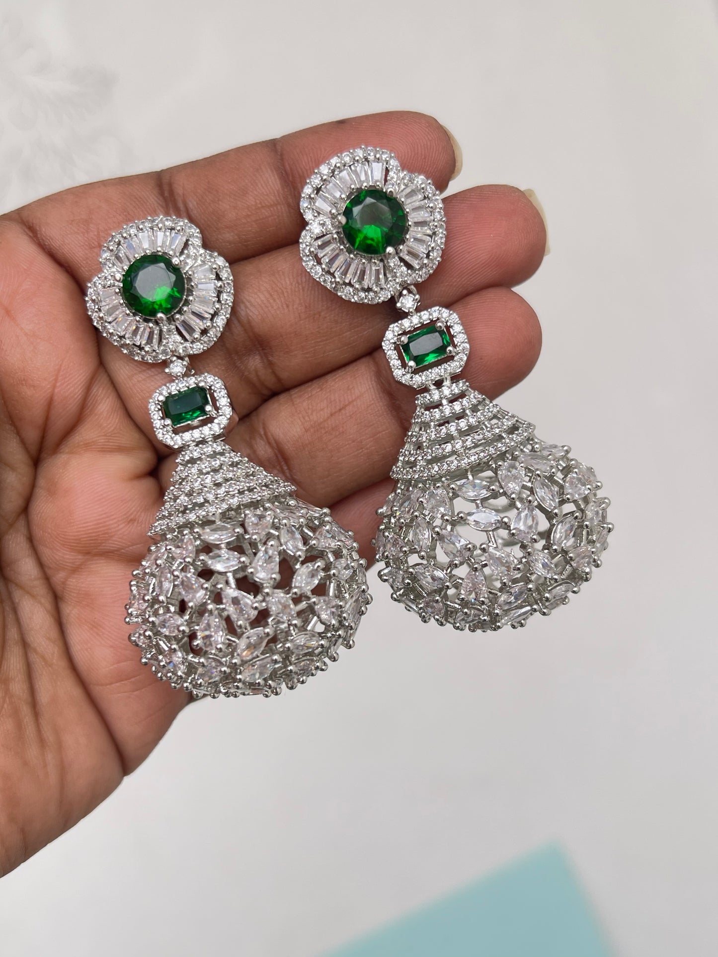 Green diamond finish round earrings