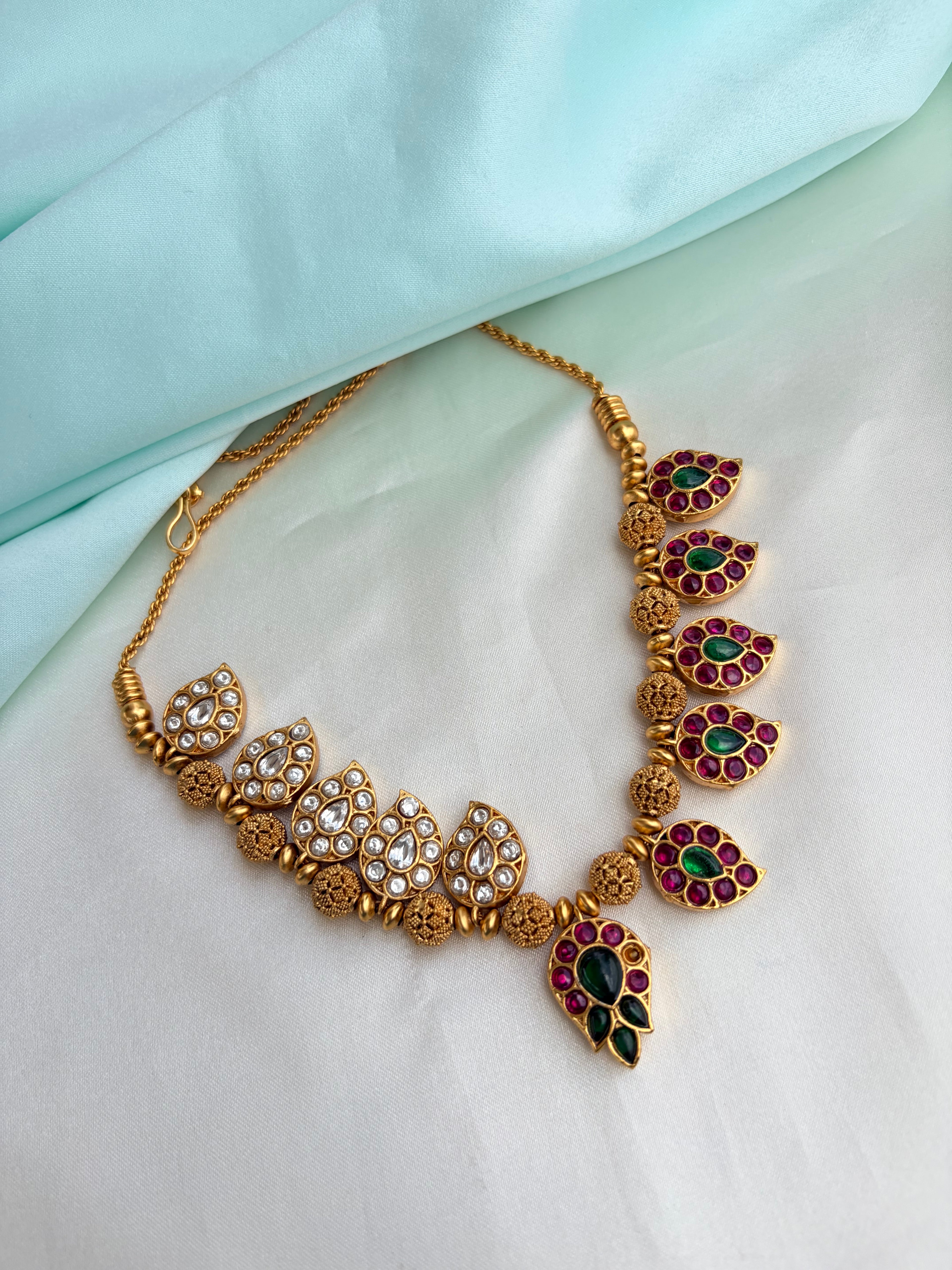 2-in-1 Dual-Sided antique gold Mango motif neckset with Ruby, Emerald, and kundan Stones Ns946