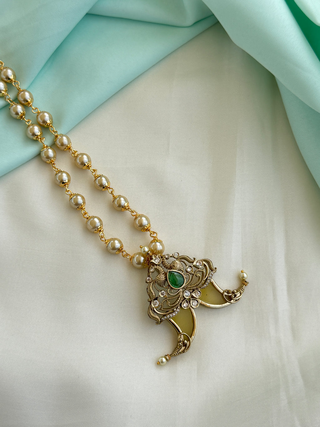 Pg016 Puligoru pendant with 24 inches pearl chain