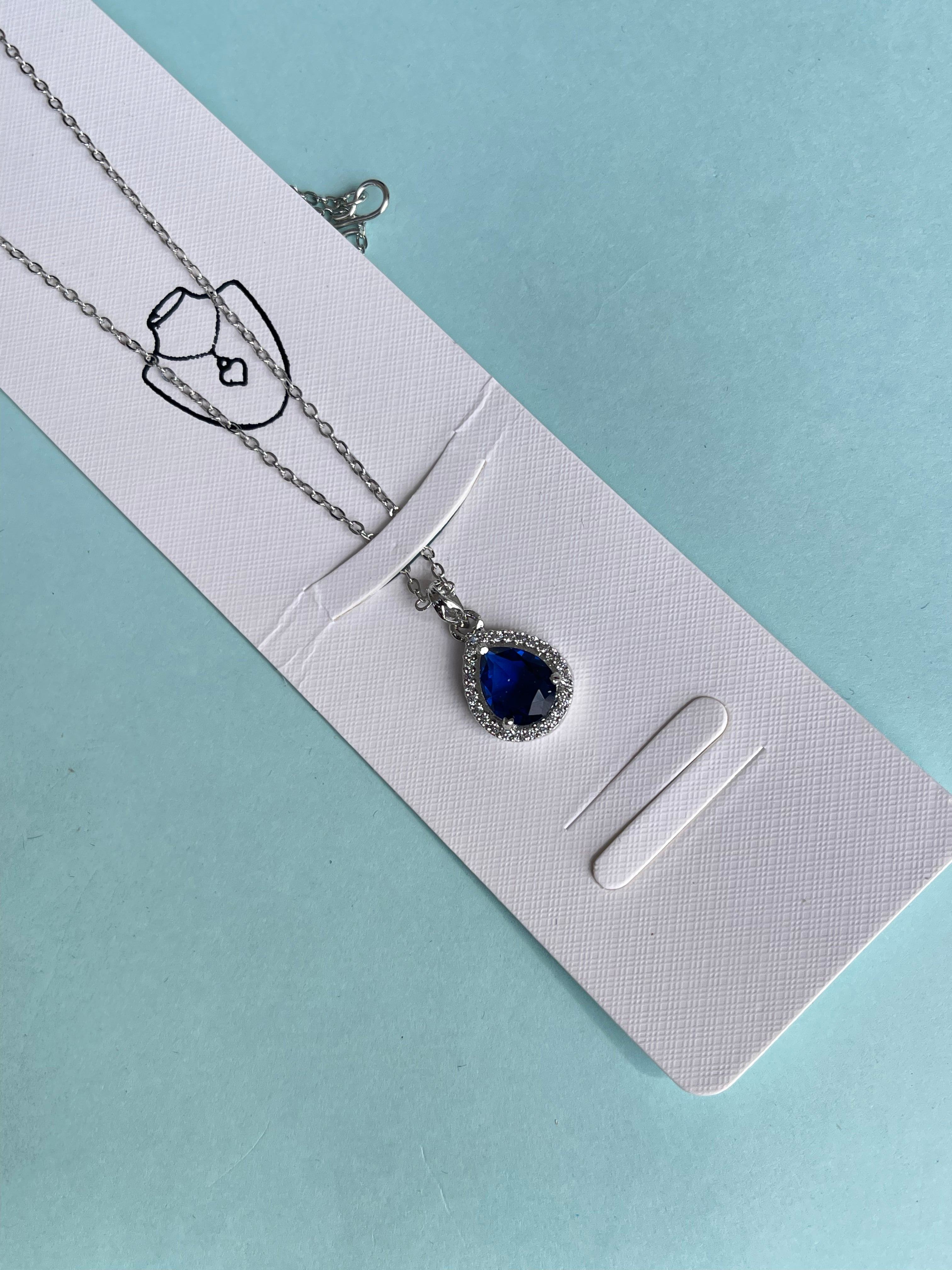 Silver chain with drop blue pendant