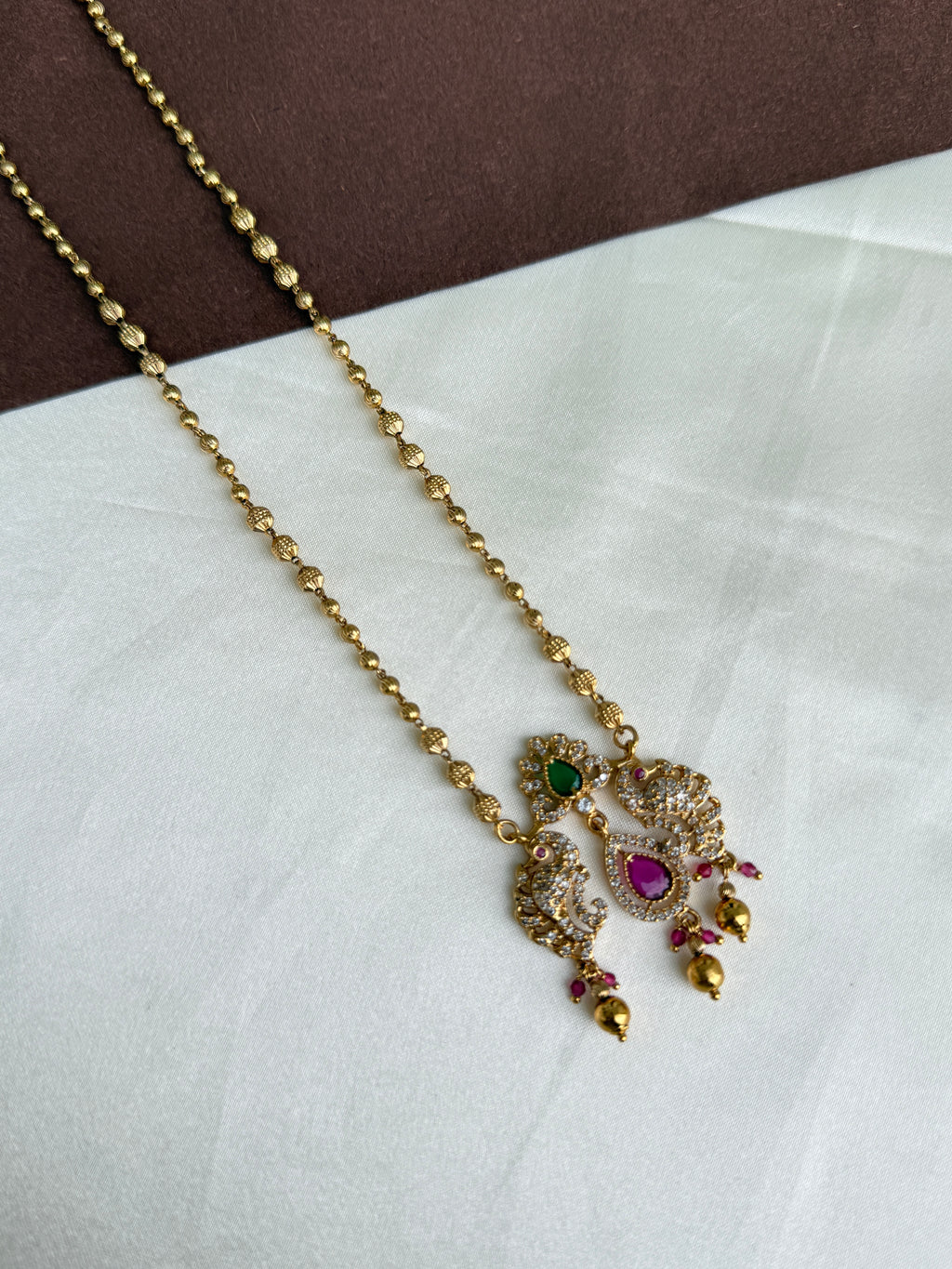 Dc026 gold balls chain with dual peacock pendant