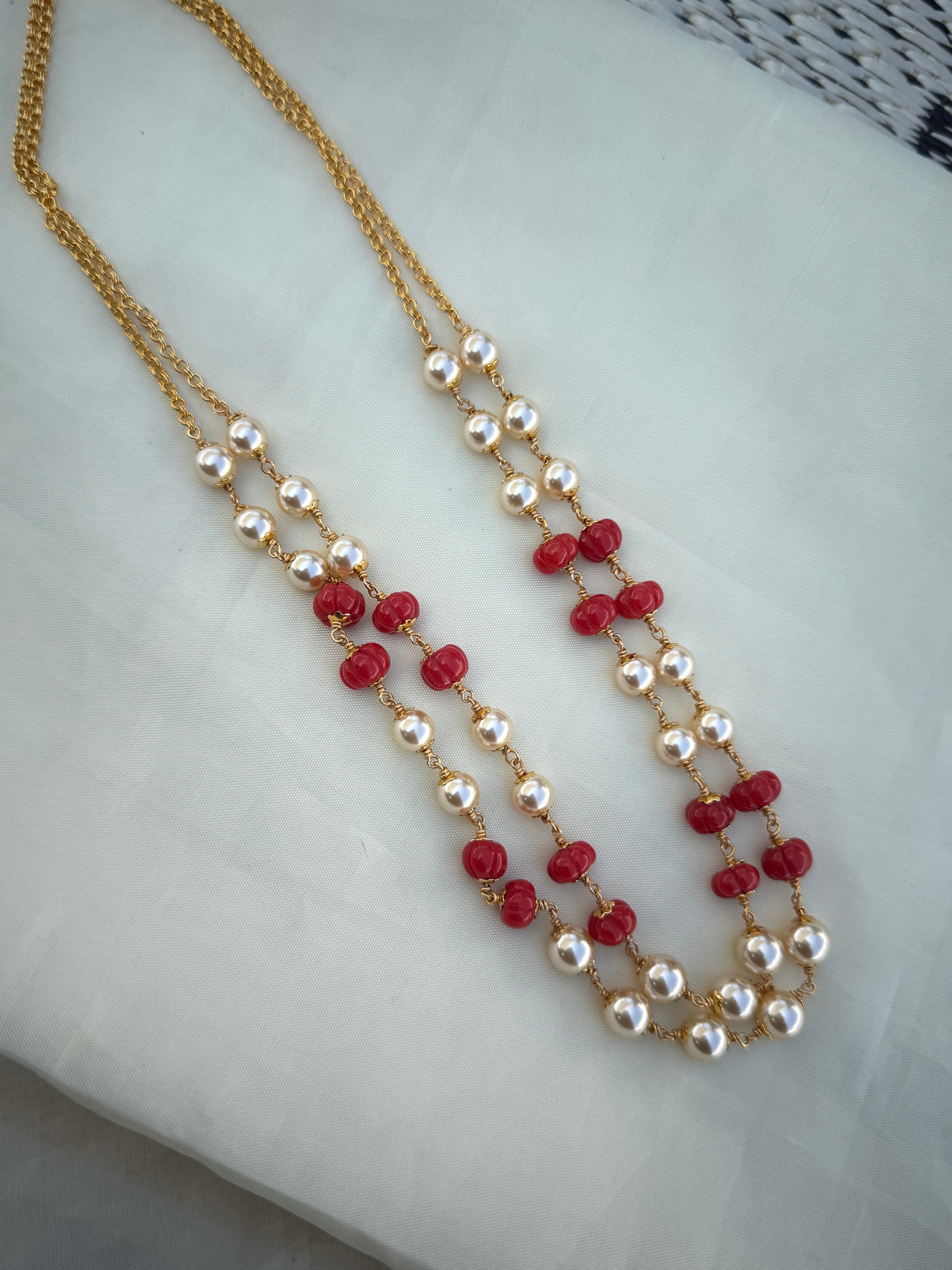 Bb229 2 lines pumpkin coral beads