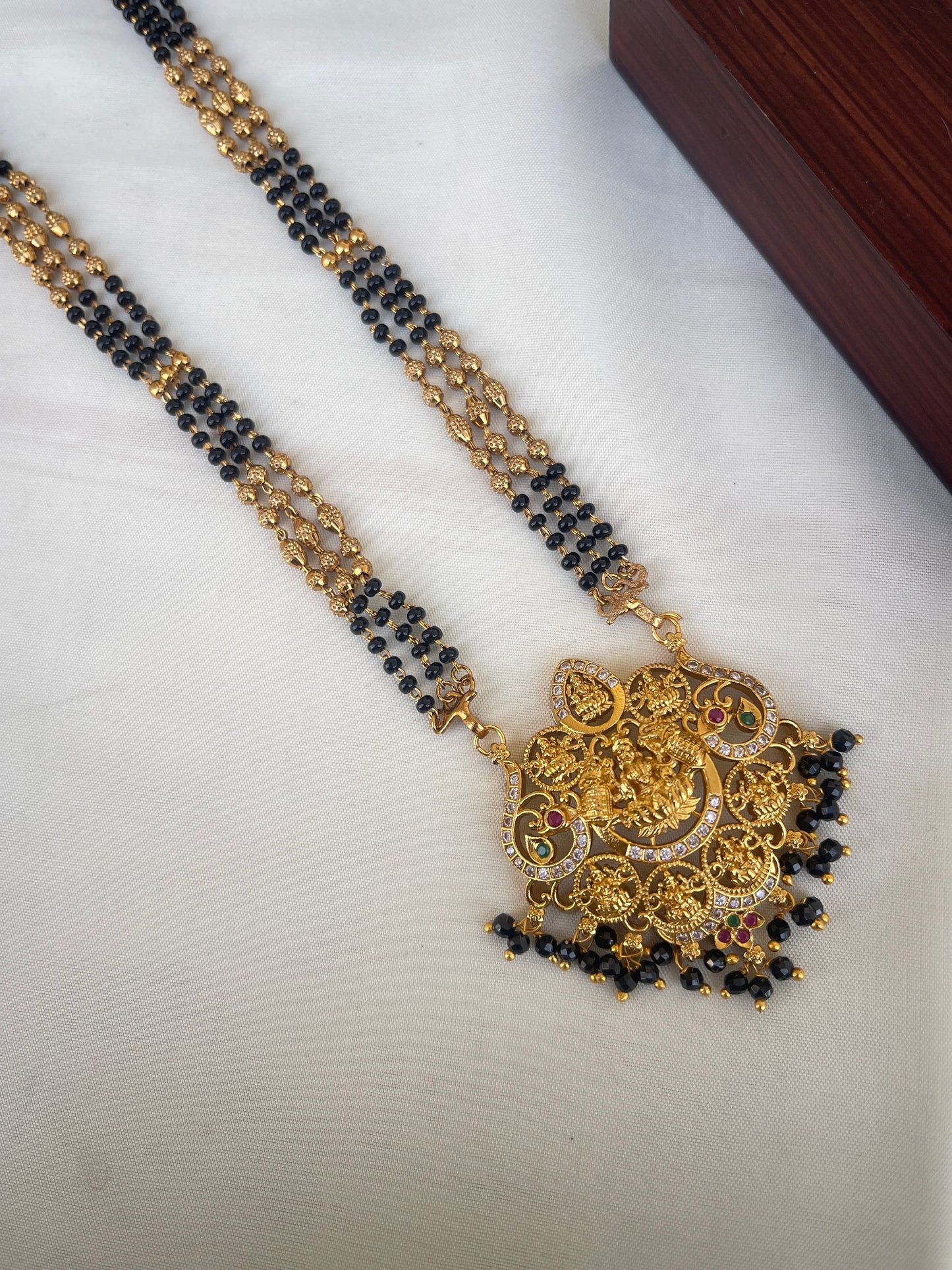 Long blackbeads with Lakshmi Devi pendant