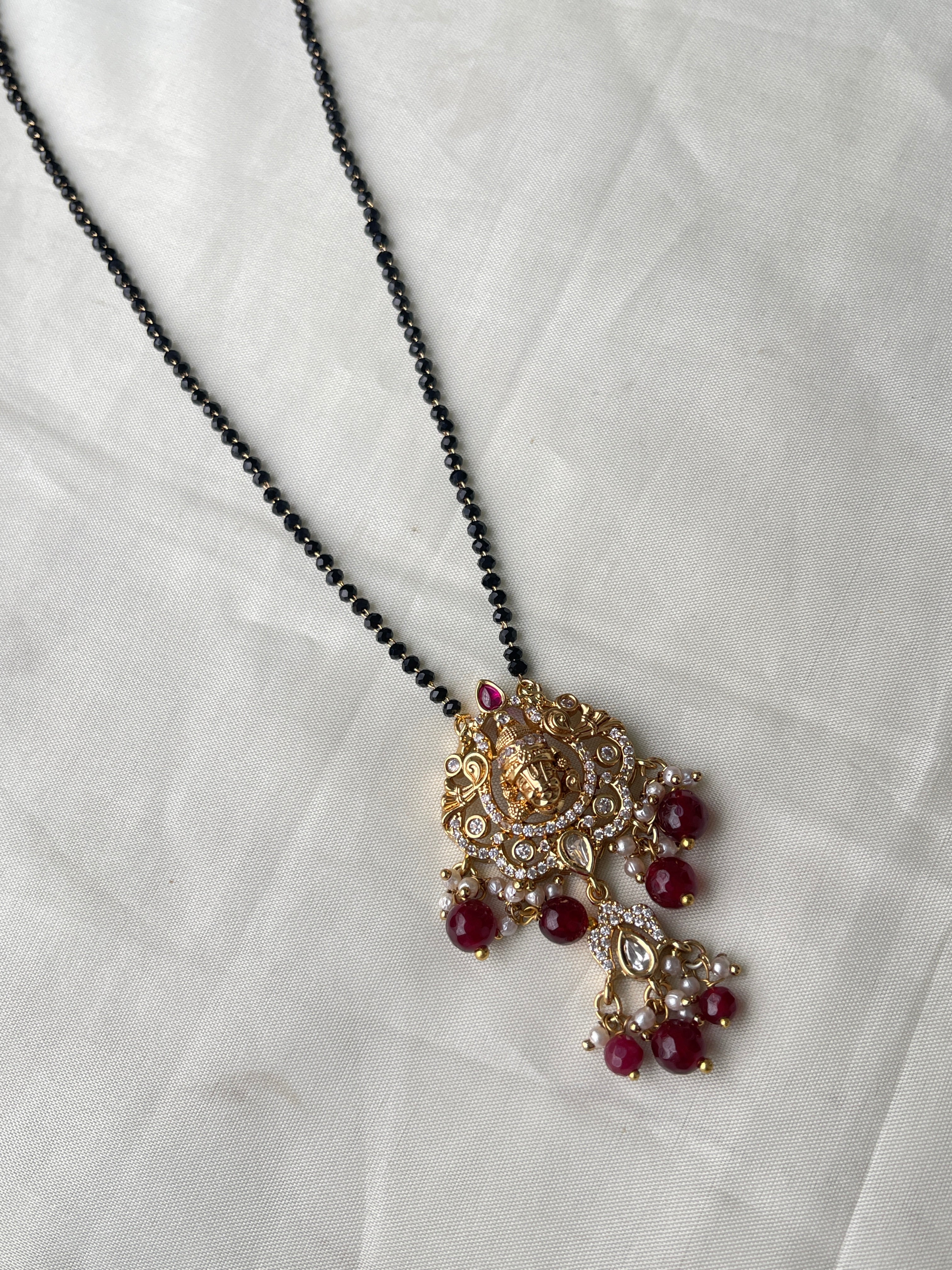 Single line short blackbeads with Lord Venkateswara pendant with moissanite stone