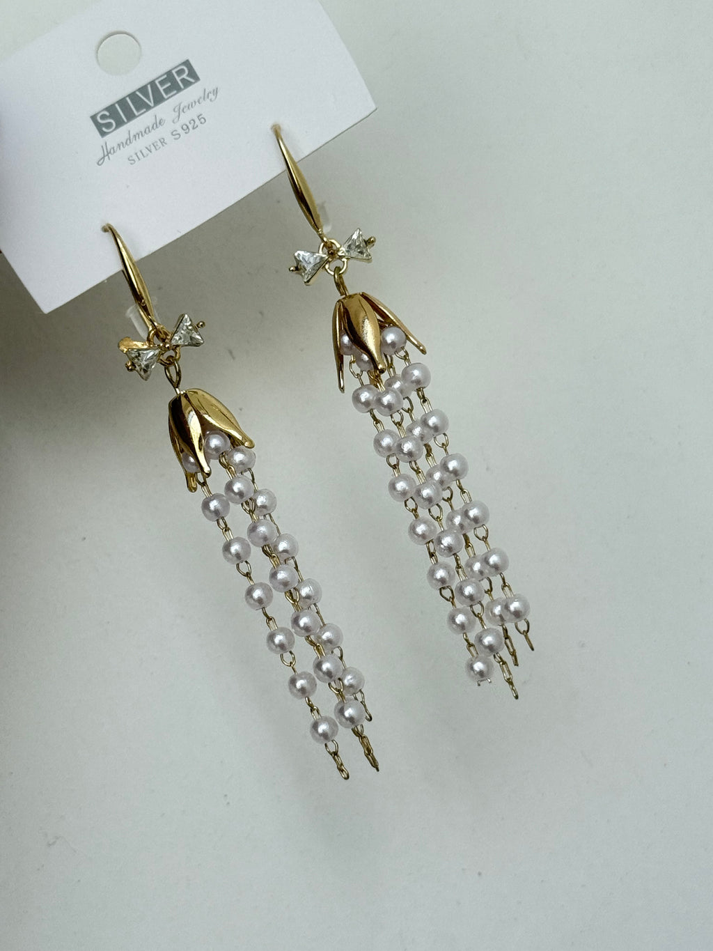 We506 pearl  tassels