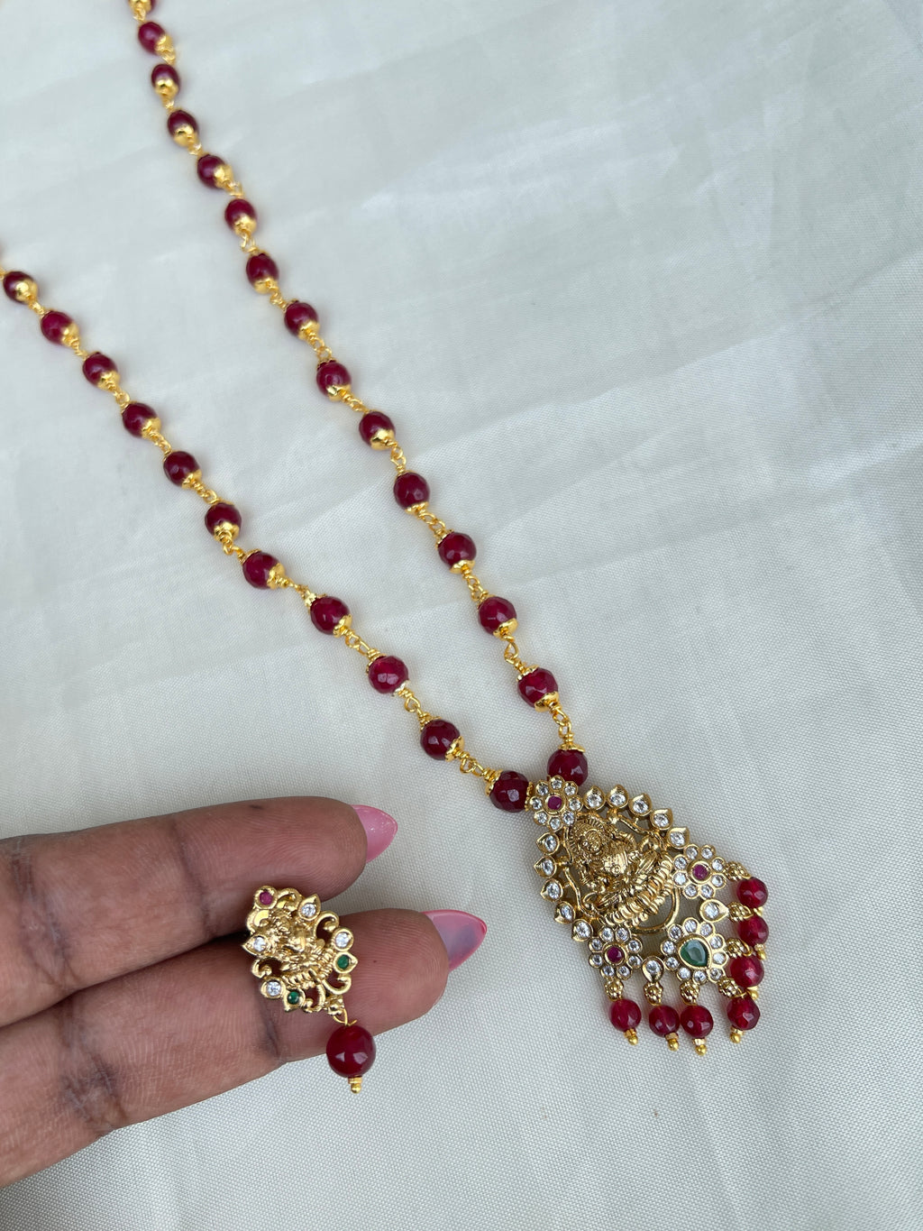 Green ruby Circle beads with kattu theega along with Lakshmi Devi pendant