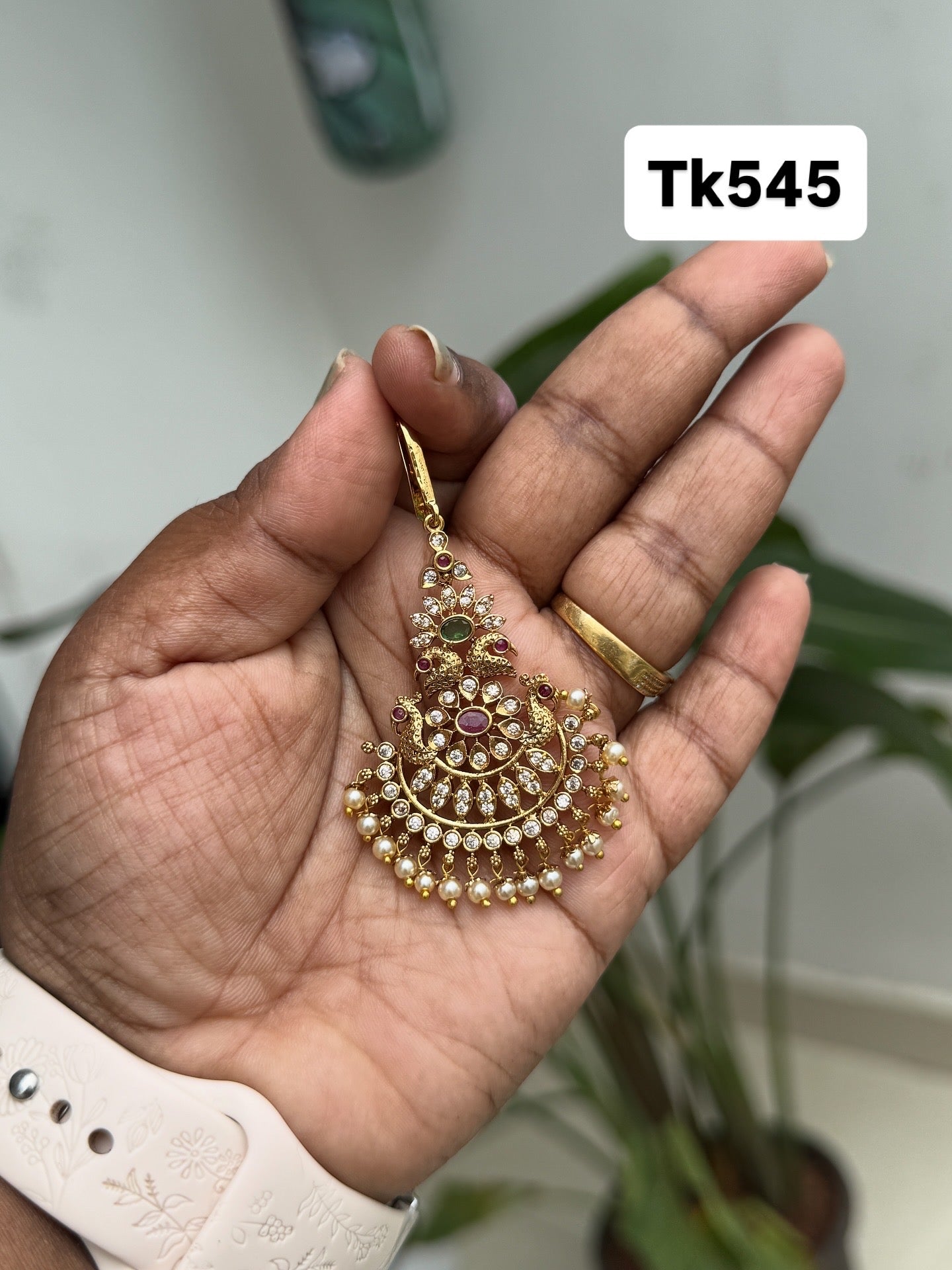 Tk545 peacock multi tikka
