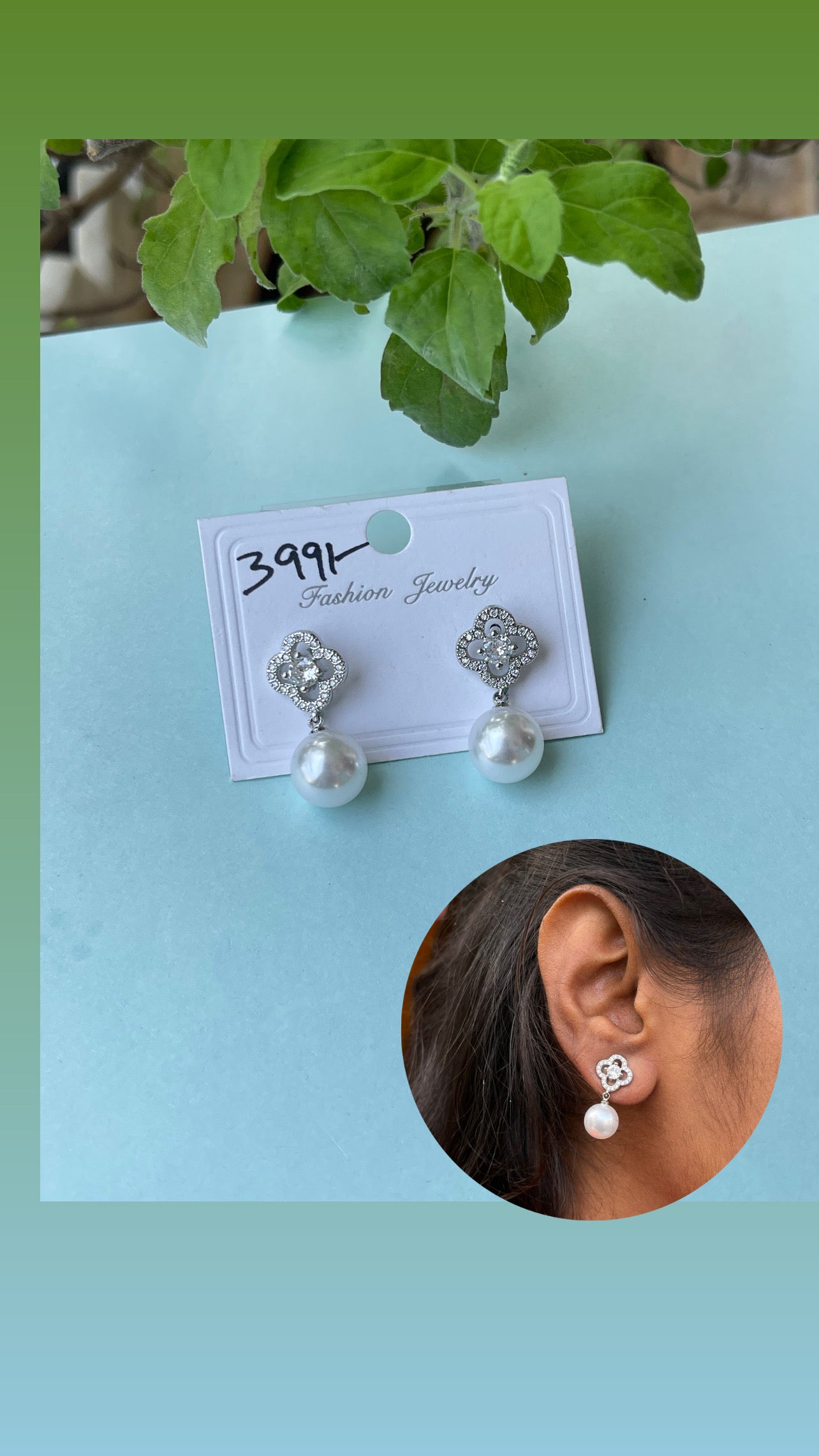 Silver pearl hanging studs