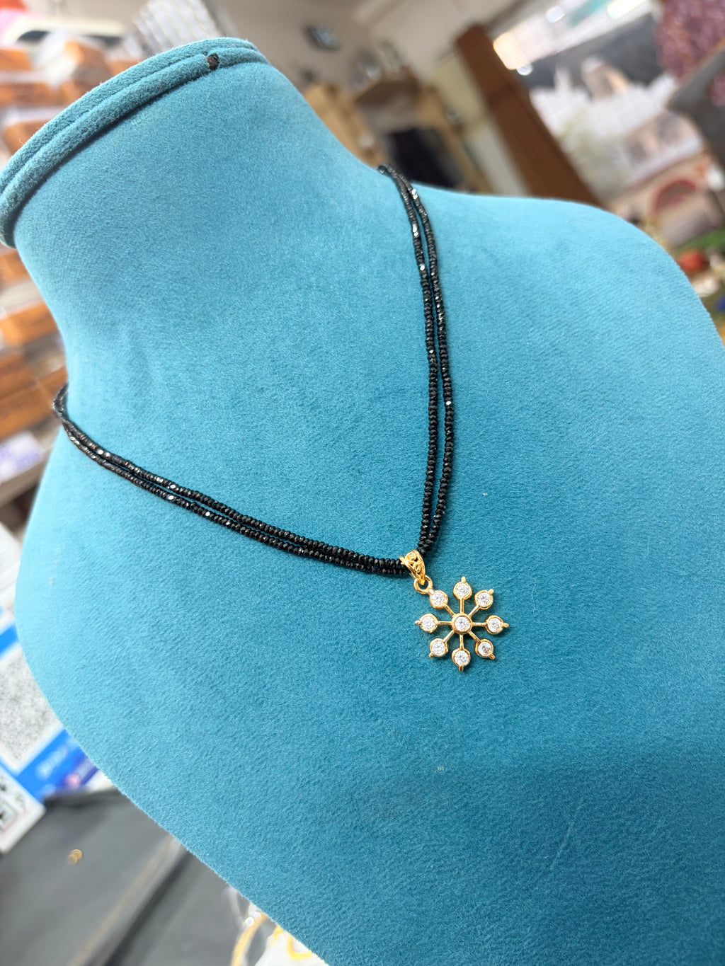 Crystal black beads with Panchaloham pendant 18 inches BB352