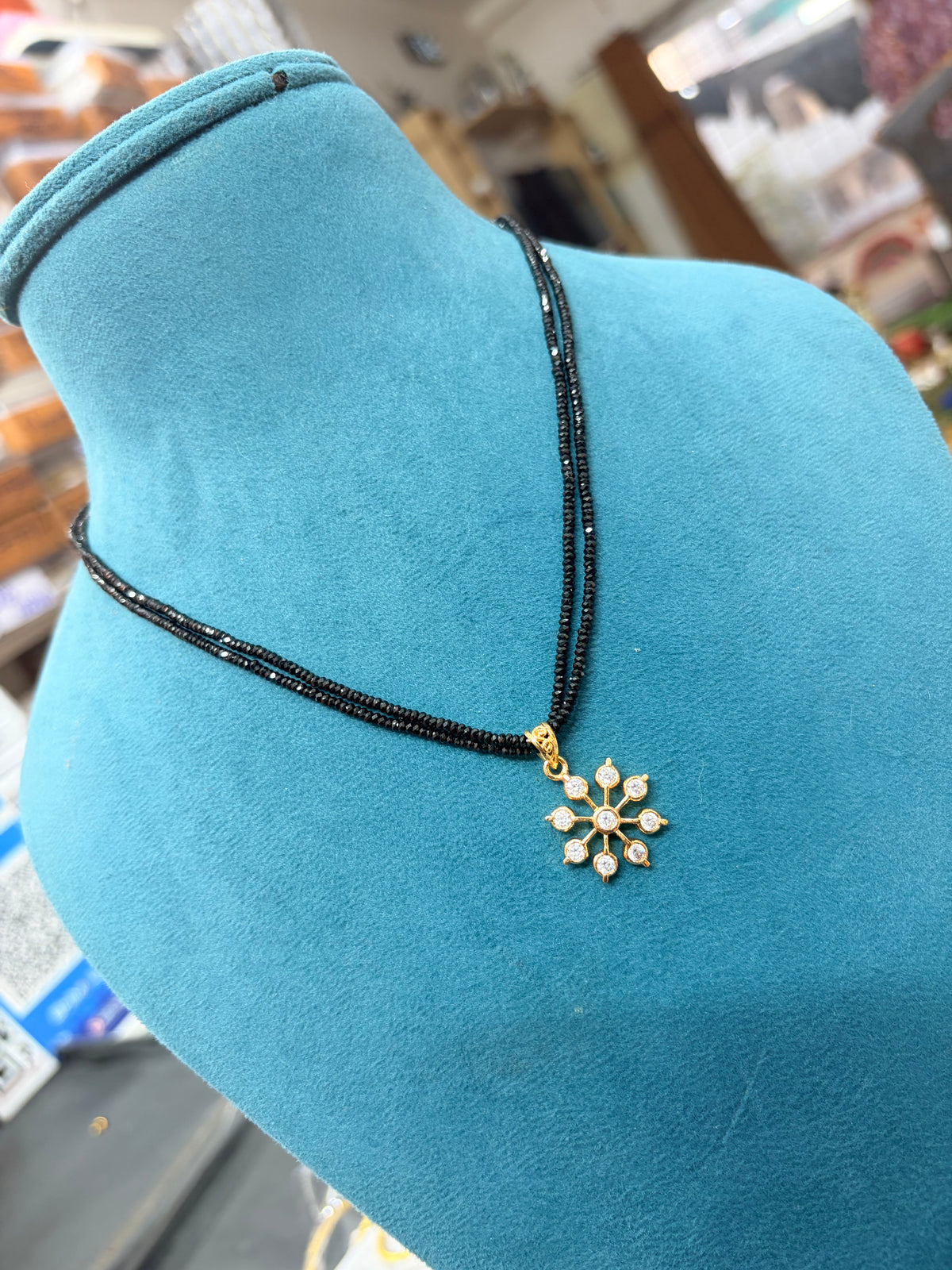 Crystal black beads with Panchaloham pendant 18 inches BB352