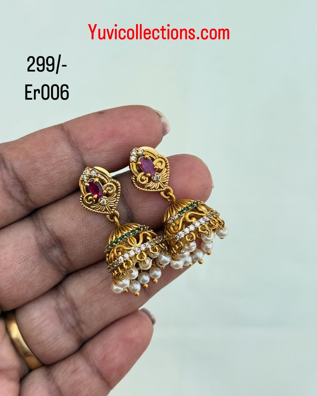 Er006 small butta cz earrings