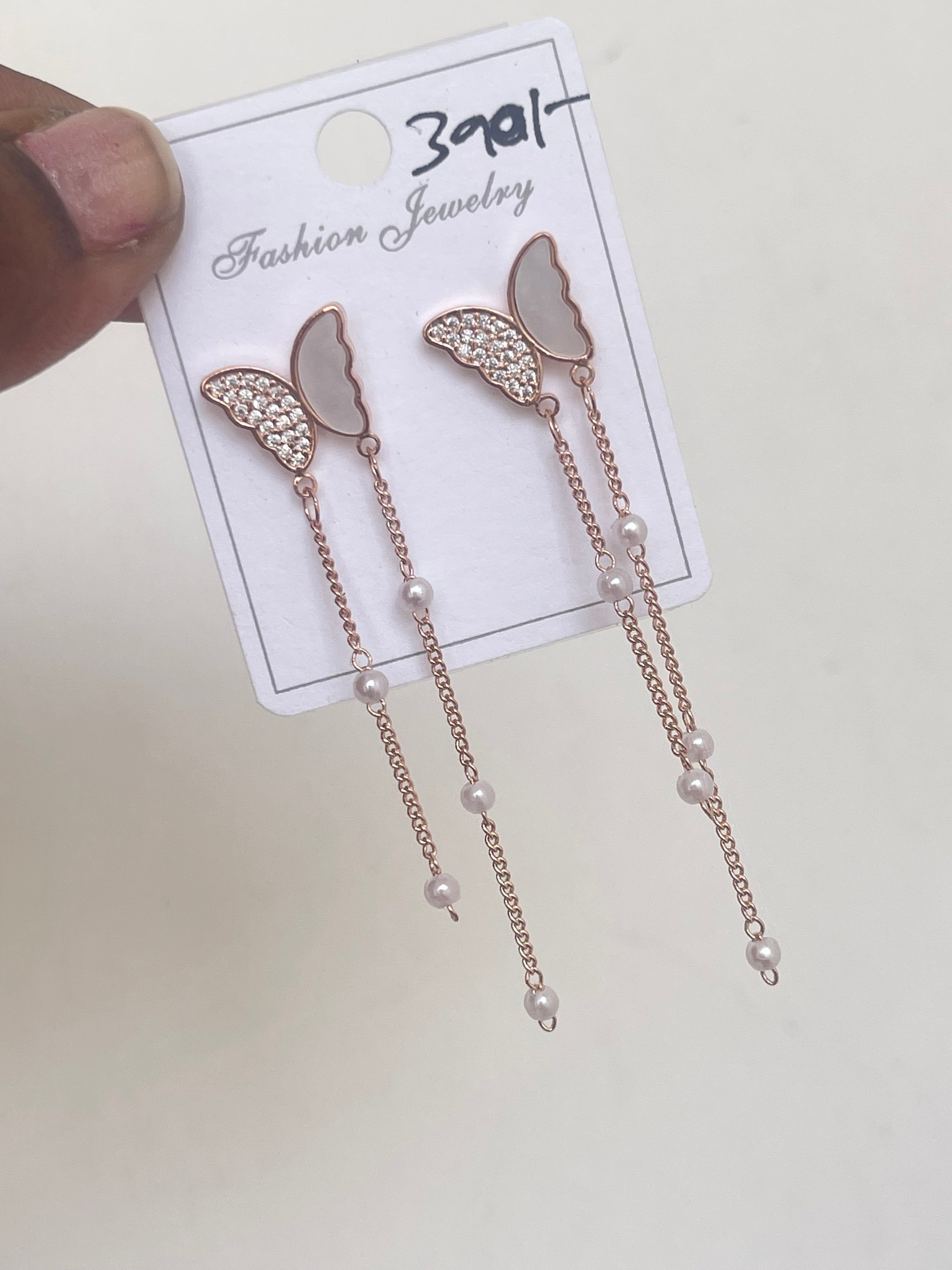 Butterfly tassels in rosegold