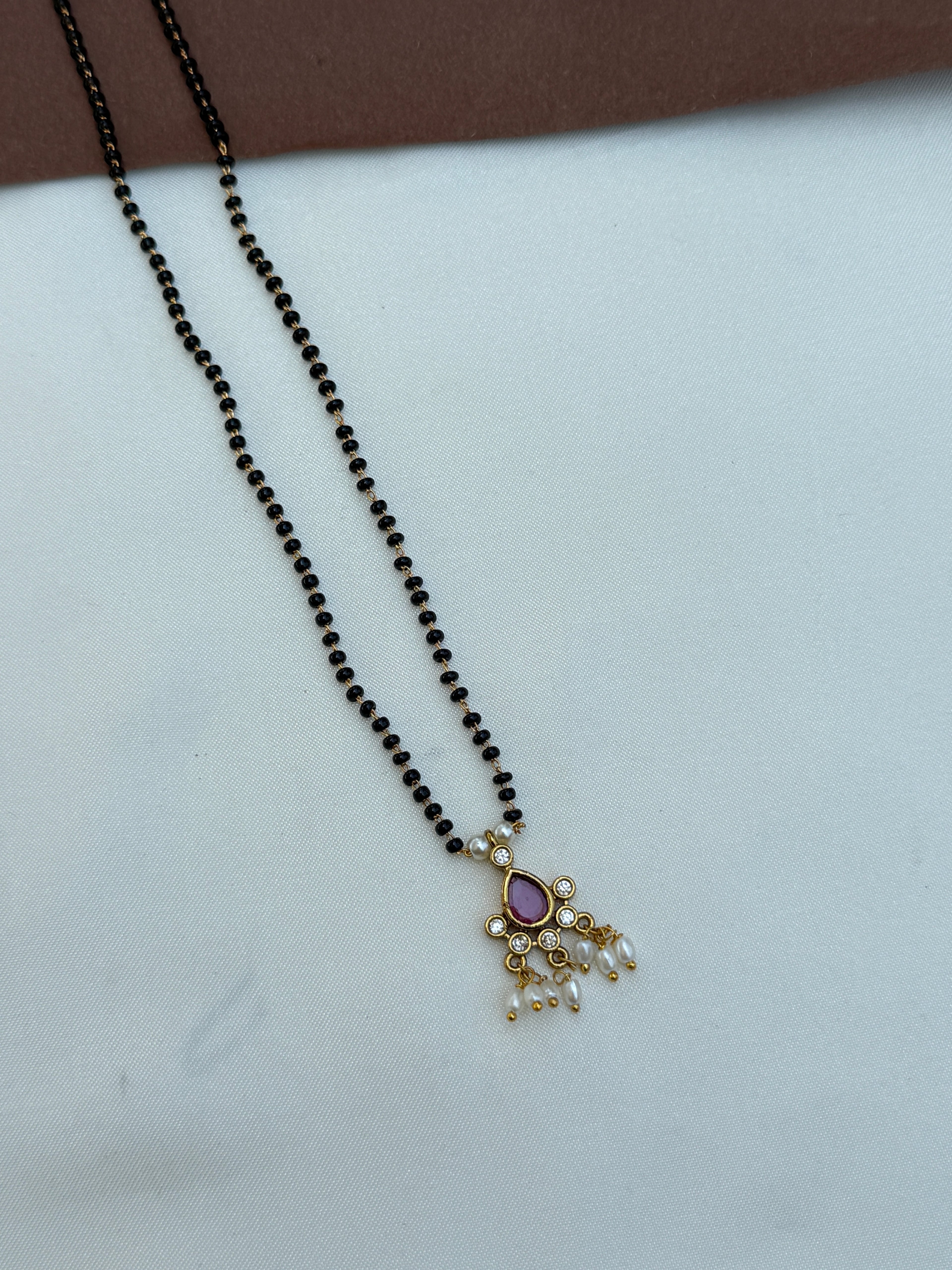 Bb106 18 inches single line kemp blackbeads with rice pearls