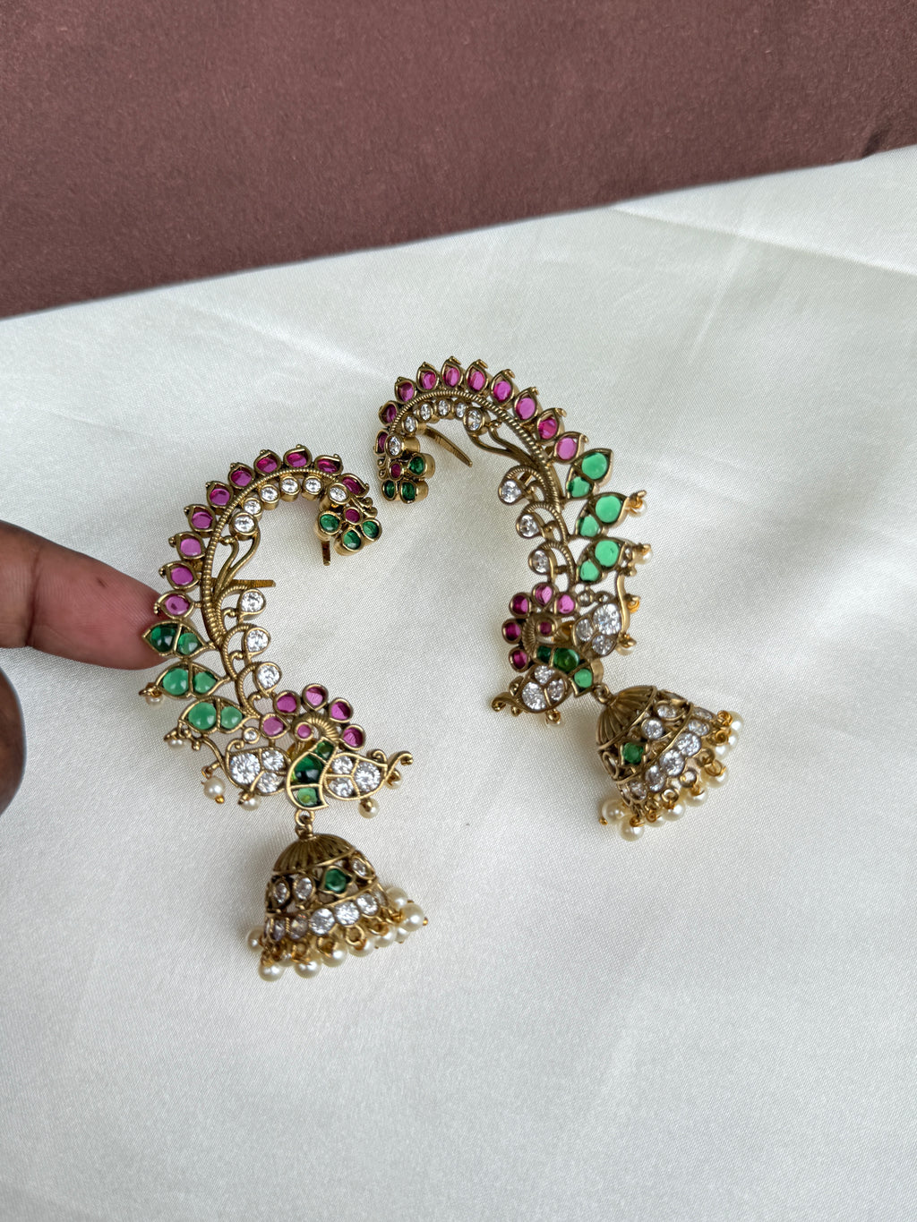 Er103 kemp peacock earcuffs