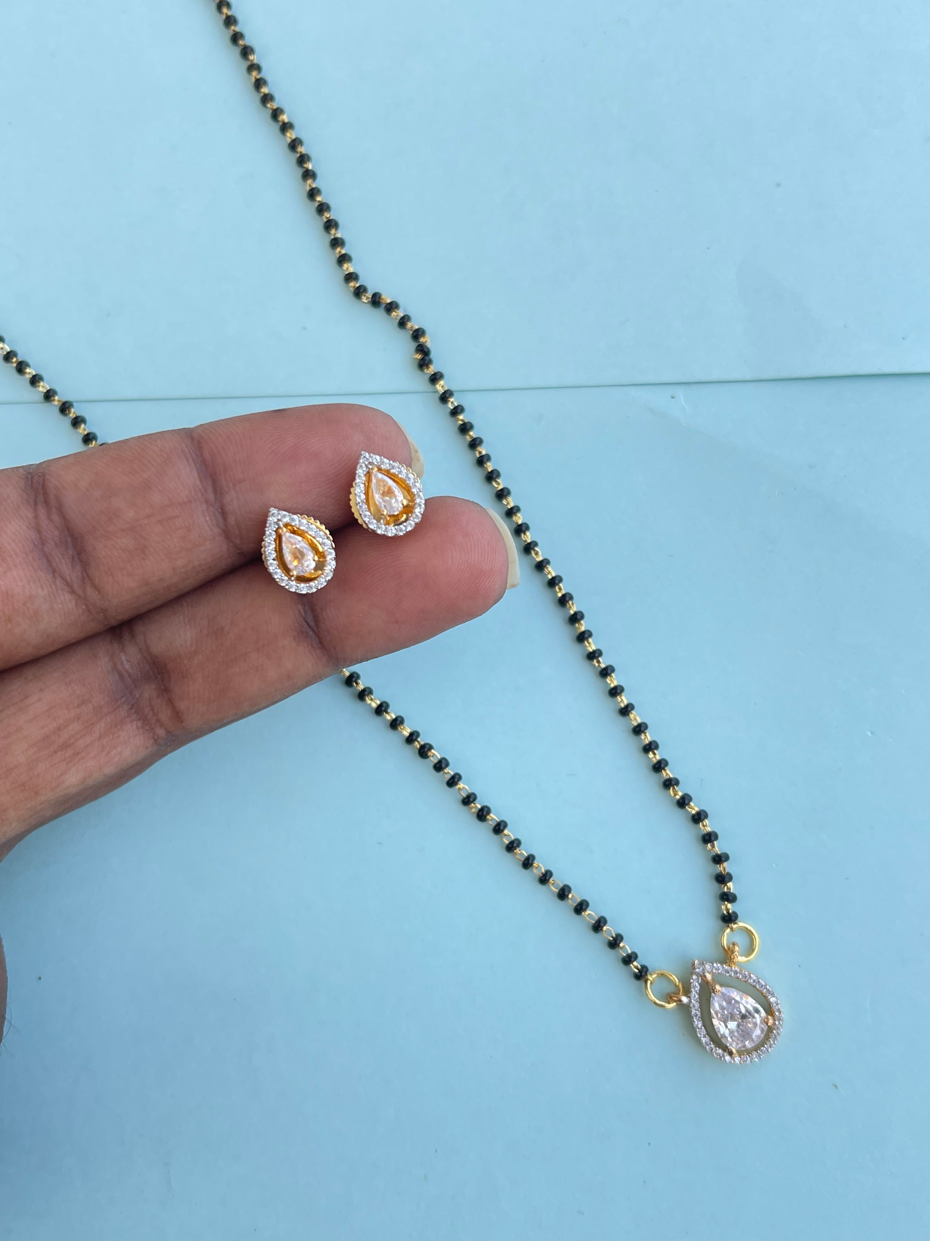 Single line Blackbeads with Diamond pendant and earrings(mangalsutra)