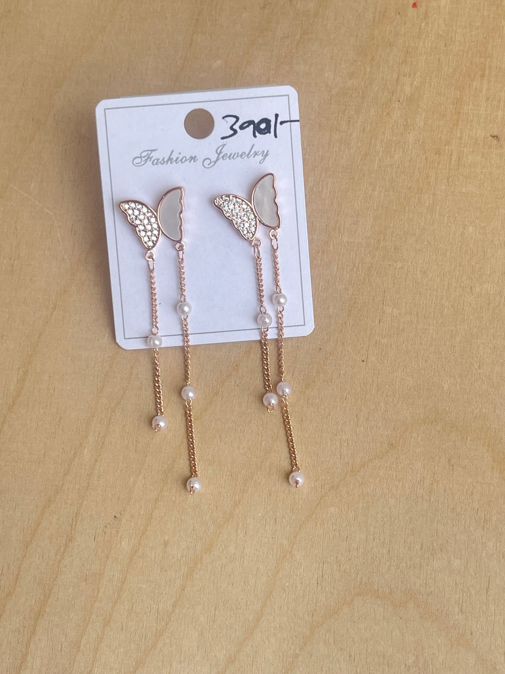 Butterfly tassels in rosegold