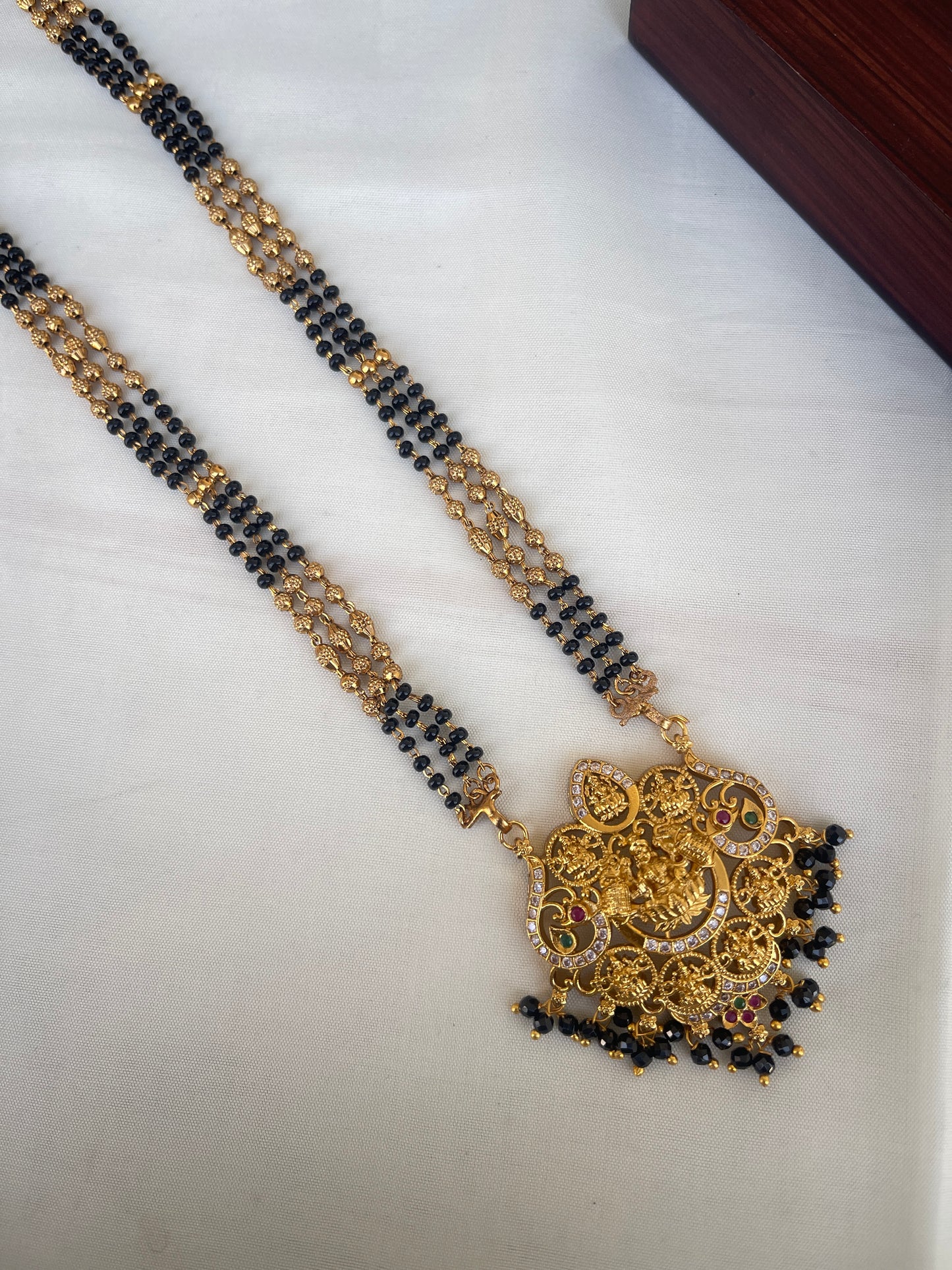 Long blackbeads with Lakshmi Devi pendant
