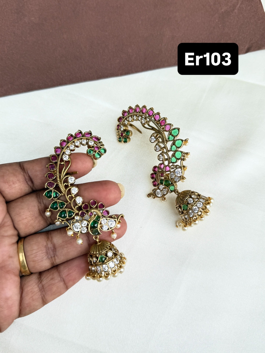 Er103 kemp peacock earcuffs