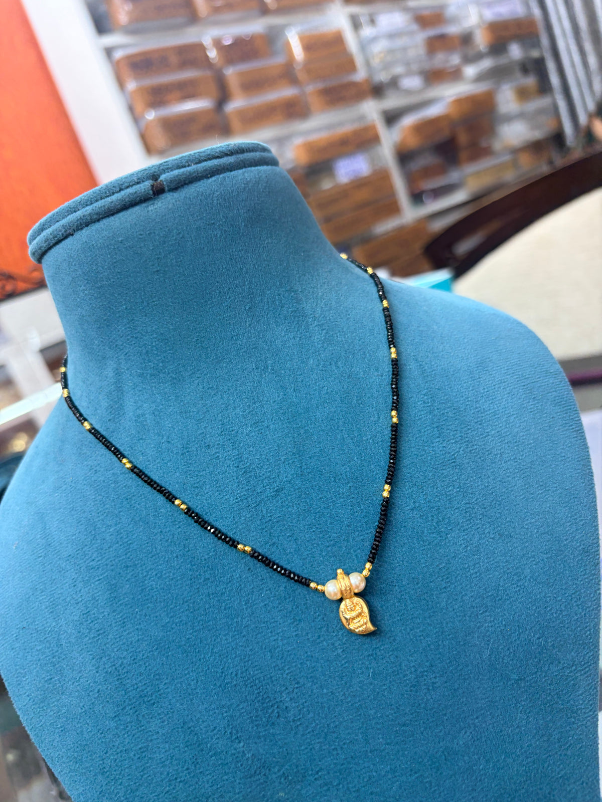 Crystal black bead with Panchaloham Lakshmi devi mango pendant 18 inches BB530
