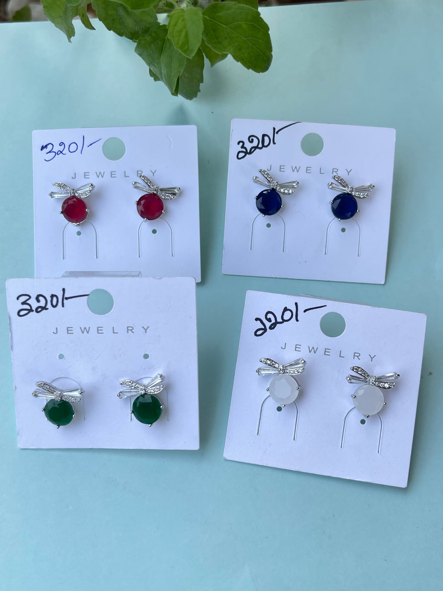 Bow studs in 4 colors