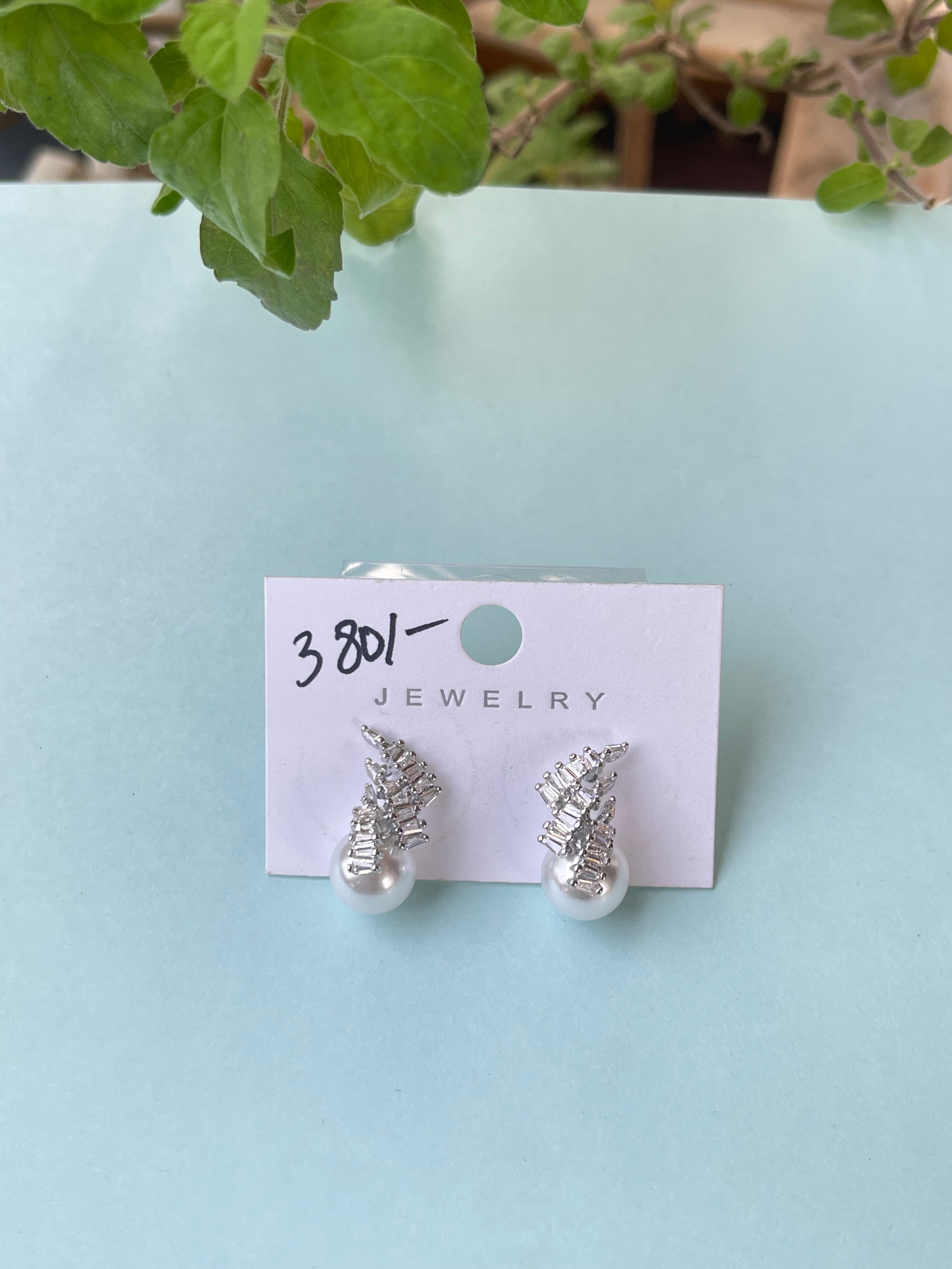 Silver pearl studs