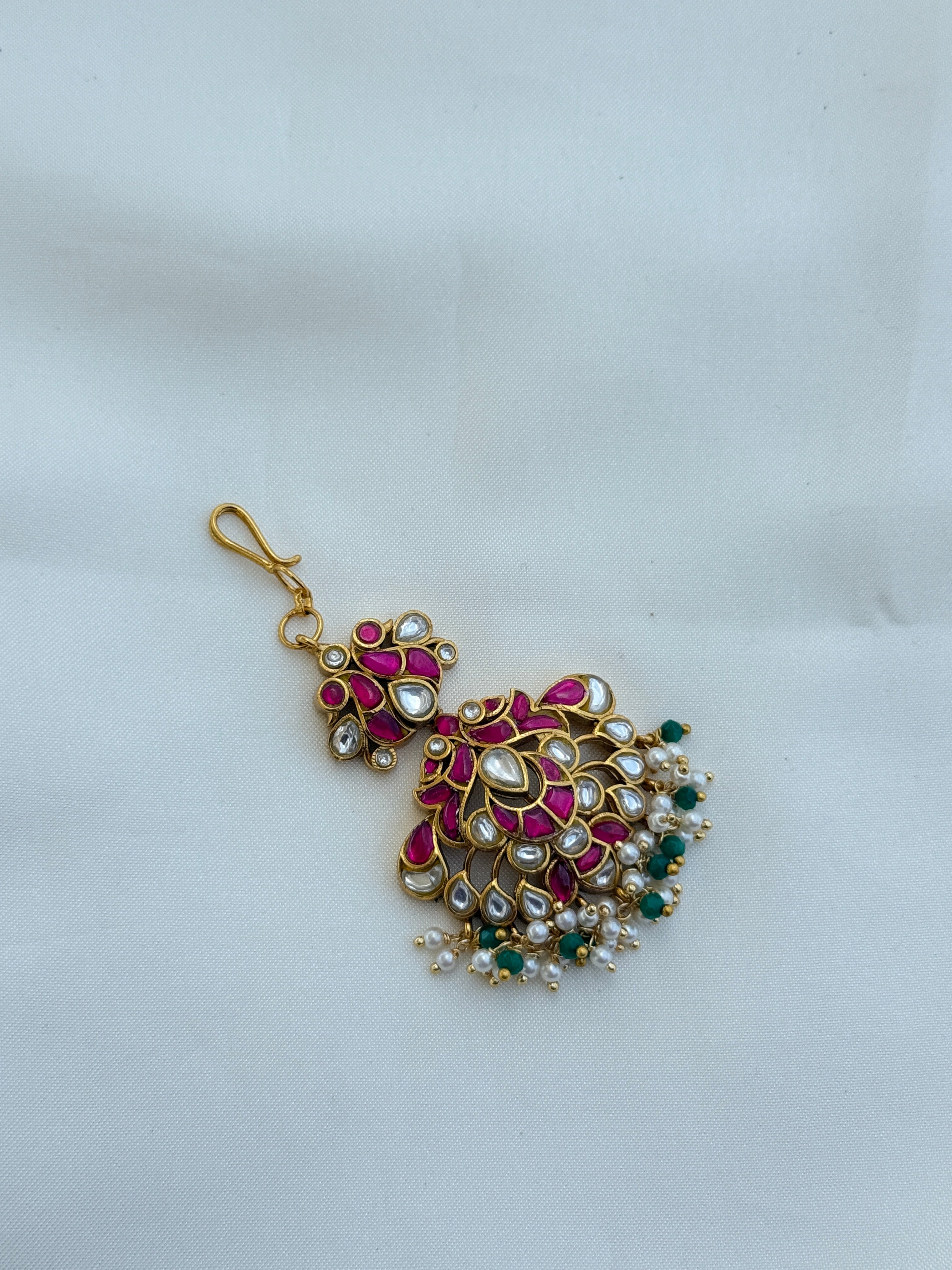 Tk554 jadau kundan peacock tikka