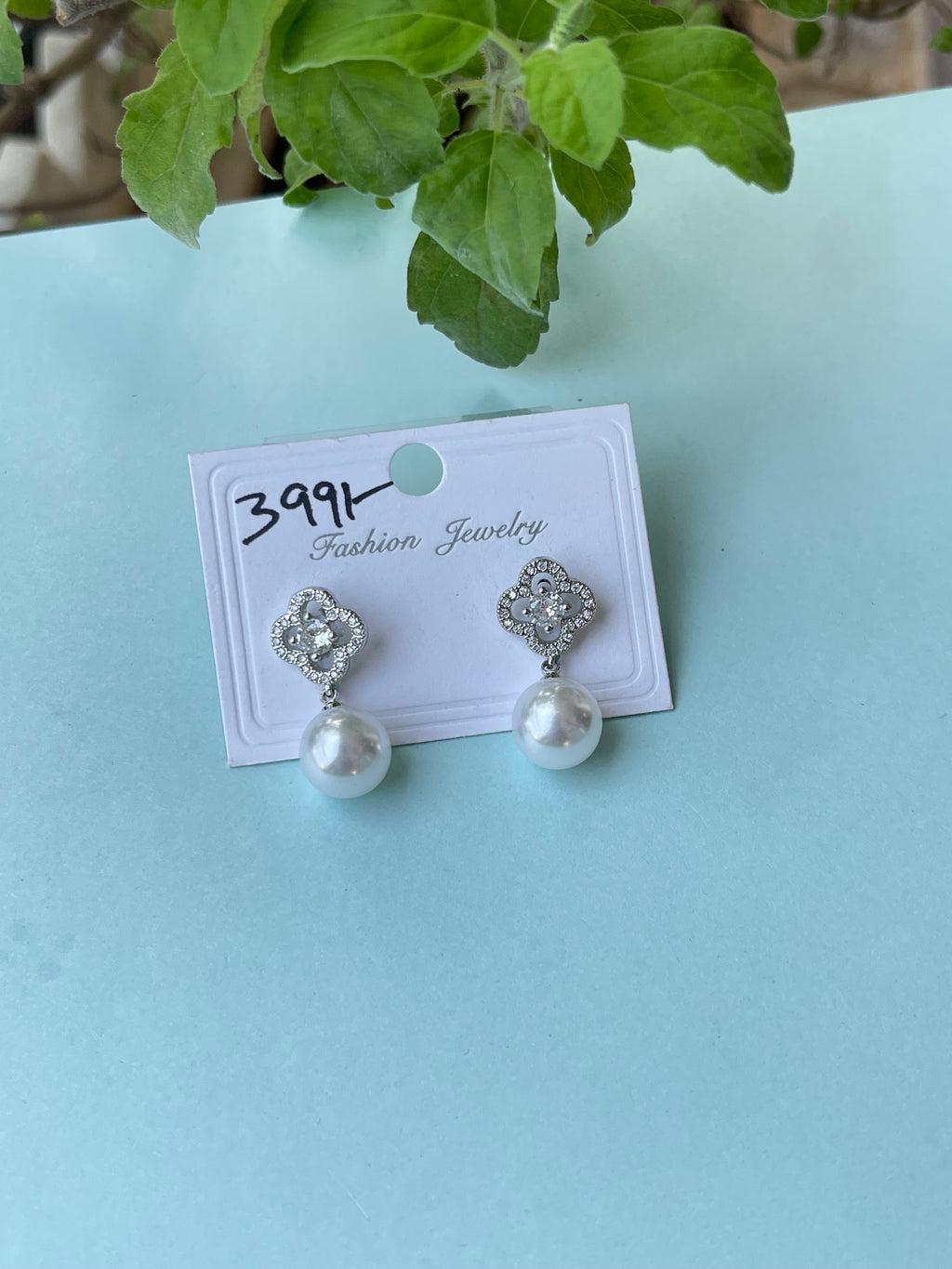 Silver pearl hanging studs