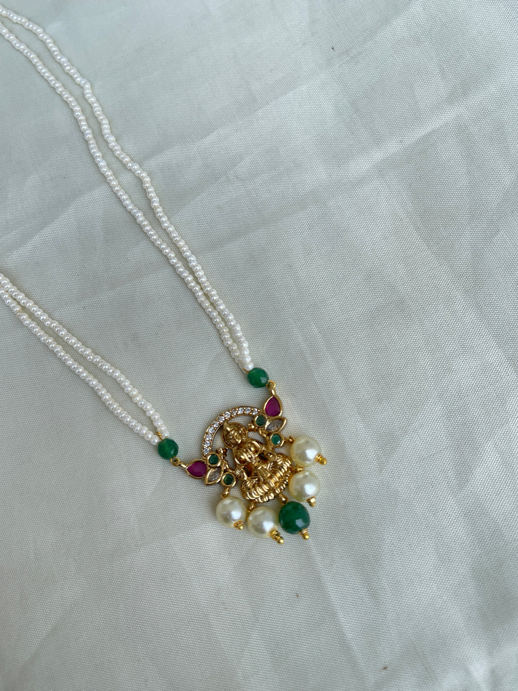 2 lines sugar pearl Lakshmi Devi pendant in ruby and green pc001