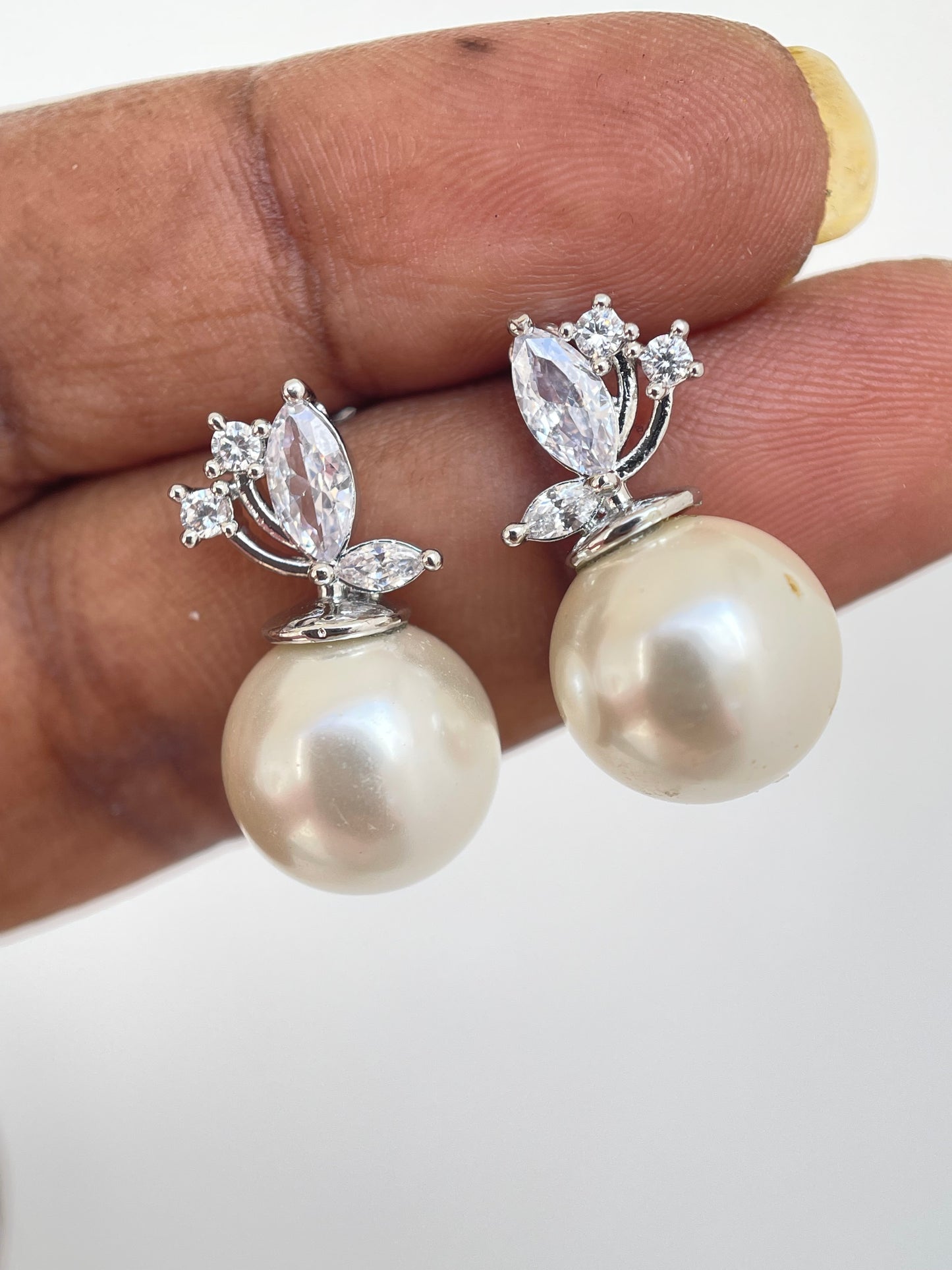 Silver pearl studs