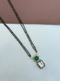 BB064 2 lines 18 inches Black Beads with green and white stone pendent