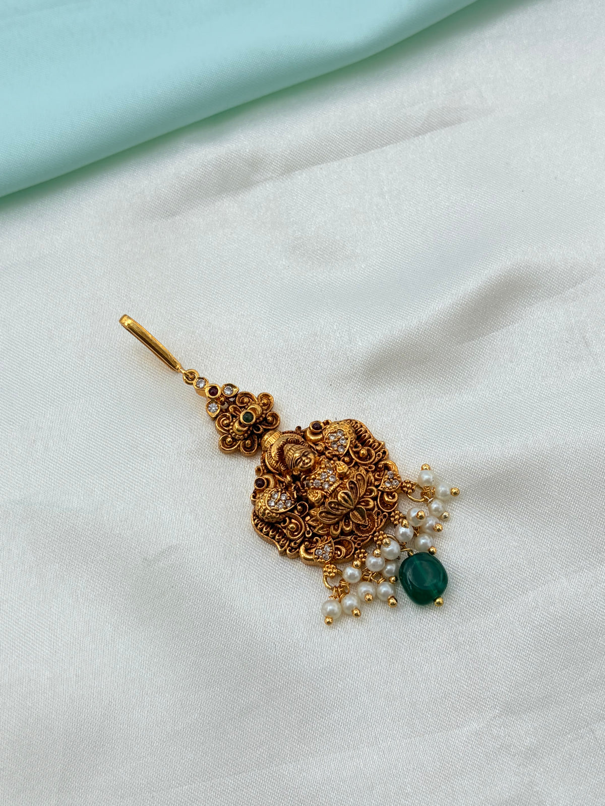 Lakshmi devi peacock design with pearls and bead tikka Tk900