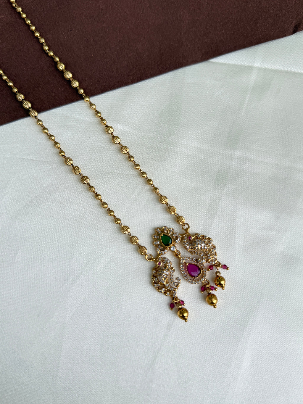 Dc026 gold balls chain with dual peacock pendant