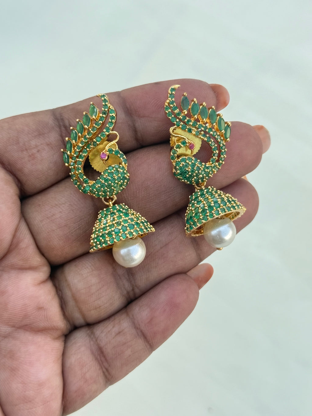 Er600 cz peacock butta Earrings