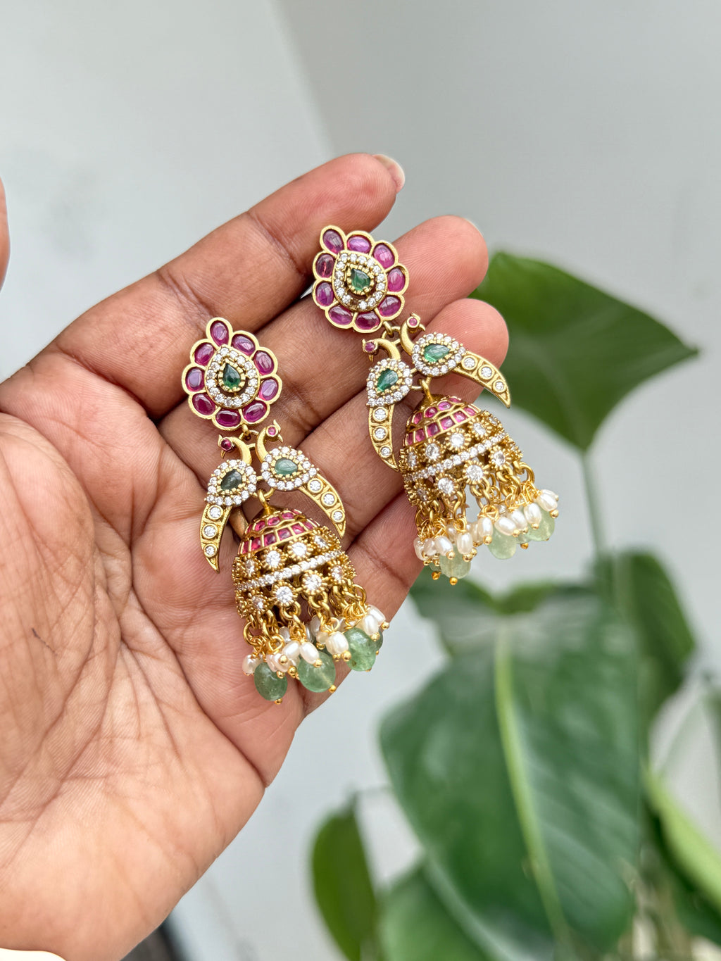 Er149 kemp peacock butta earrings