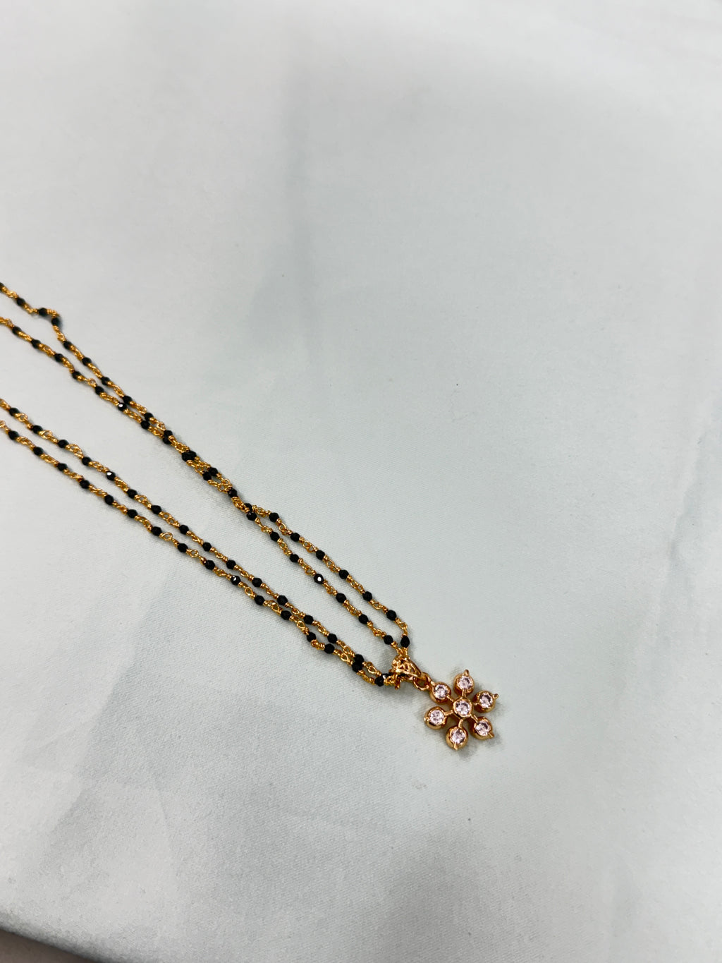 Bb221 micro gold 2 layers black bead with Panchaloham pendant 18inches black beads