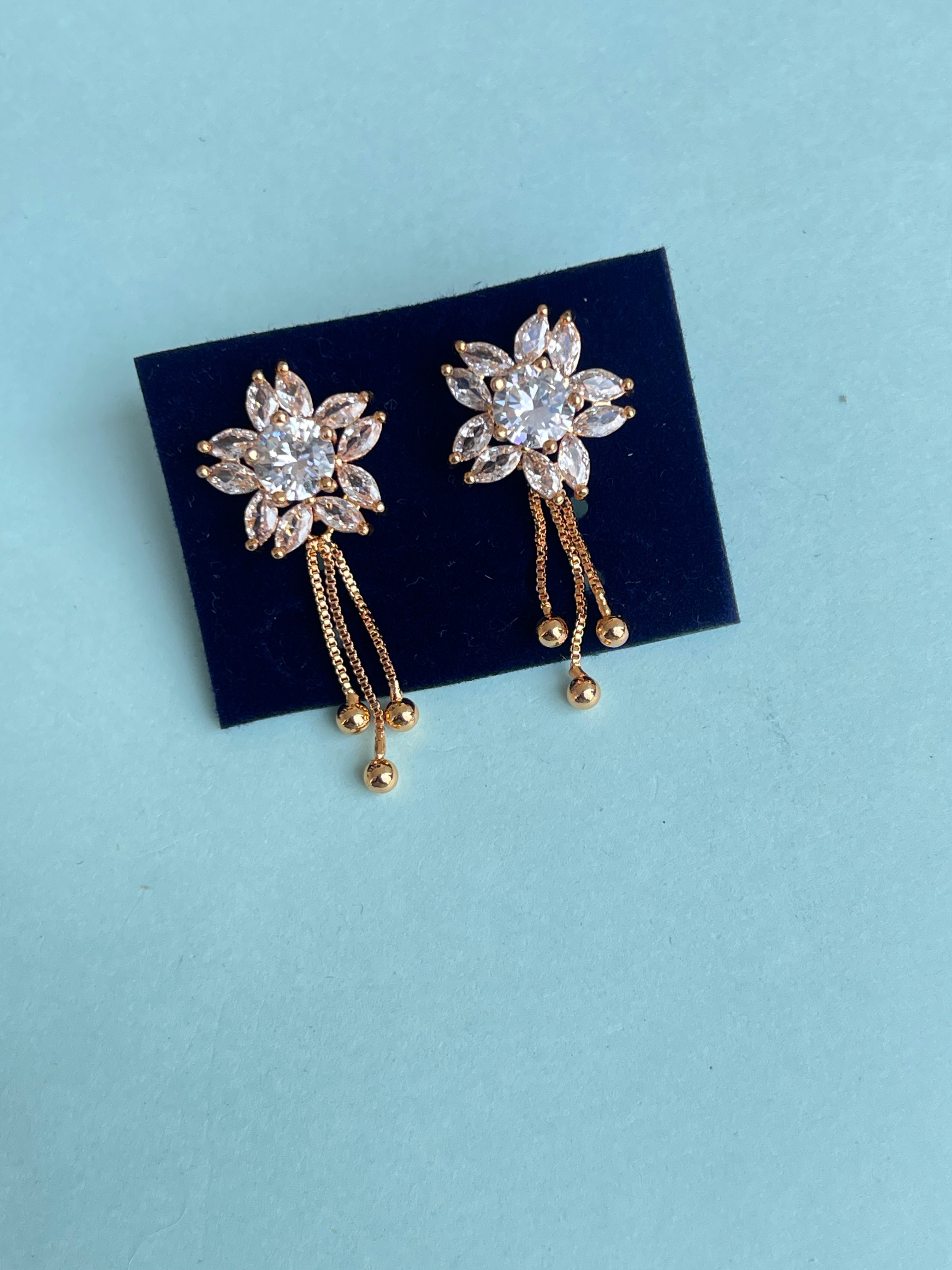 Flower studs with tassels