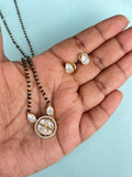 Kundan pendent and earrings 
Single line 18 inches blackbeads bb1636