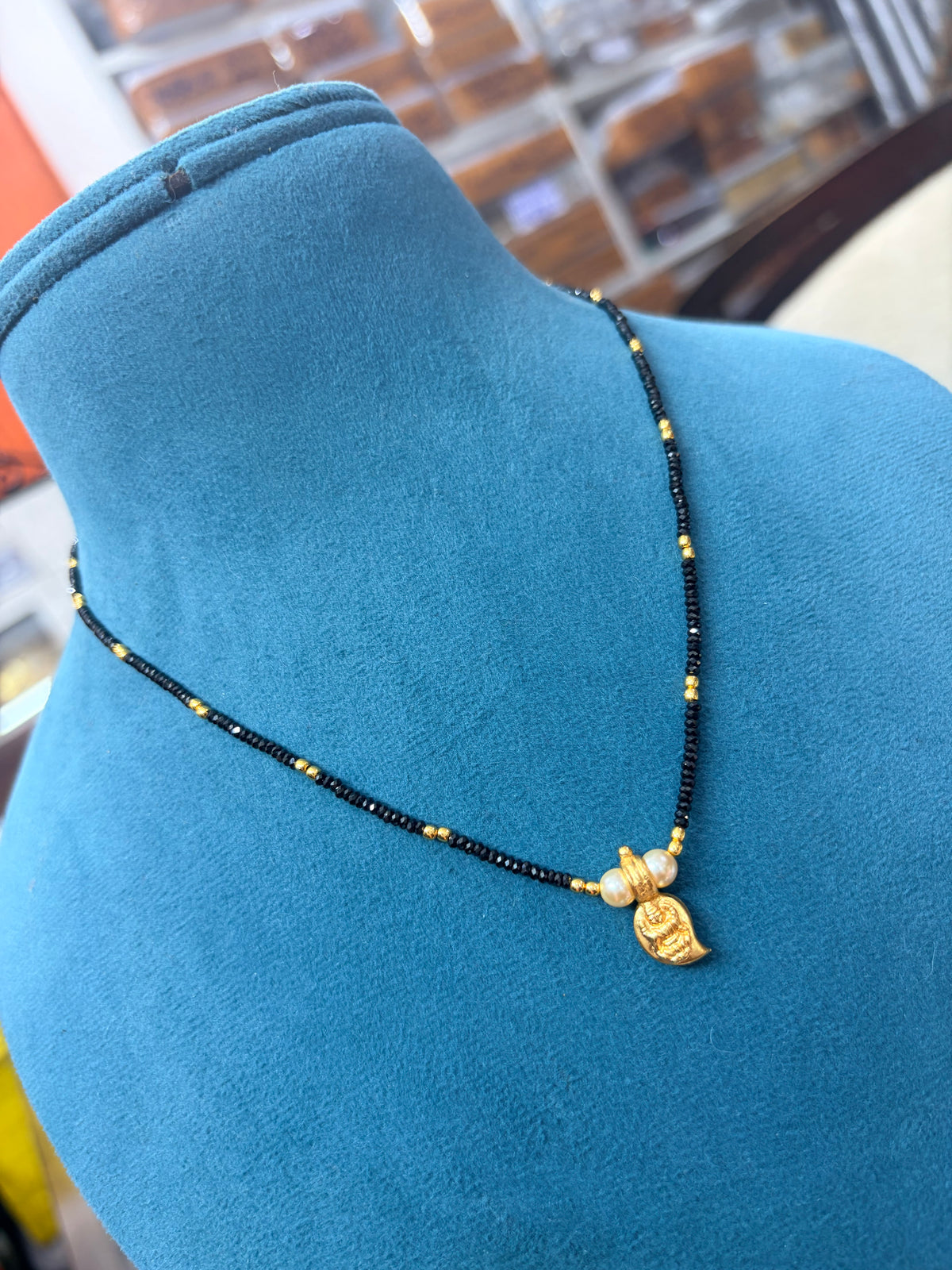 Crystal black bead with Panchaloham Lakshmi devi mango pendant 18 inches BB530