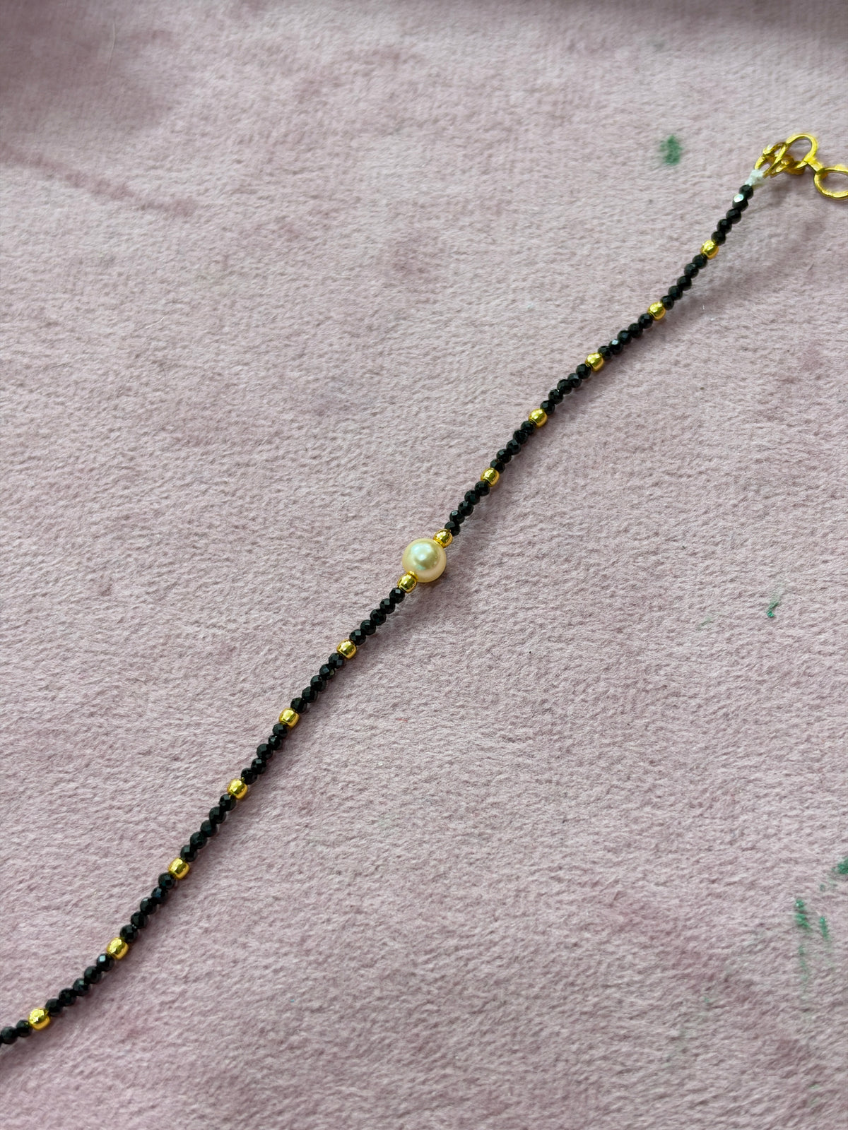 Br006 crystal black bead and gold balls with pearl bracelet 5.5 inches