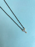 Single line short blackbeads with triangle pendant drop
